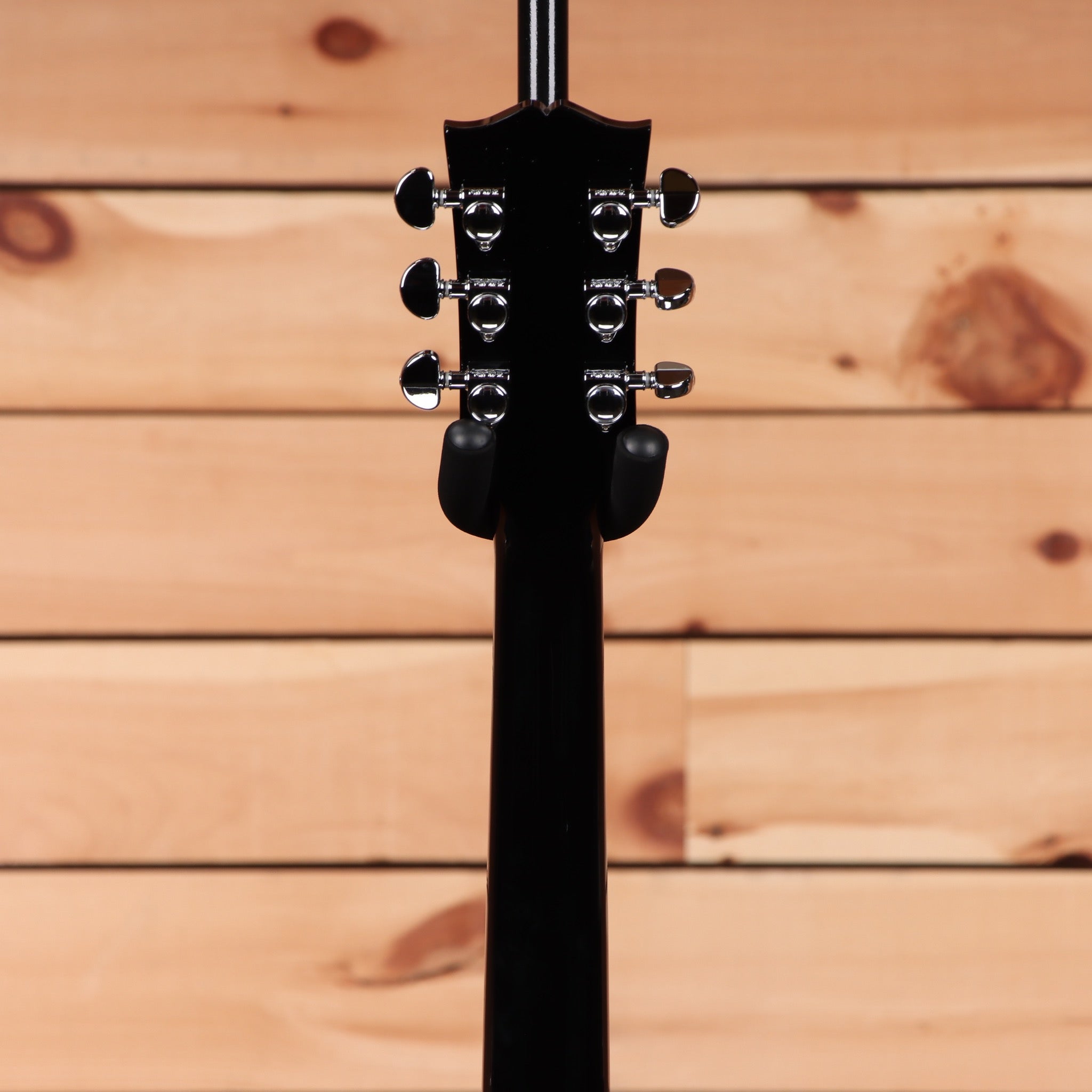 Gibson Les Paul Studio Ebony electric guitar with chrome tuning pegs and dual humbuckers