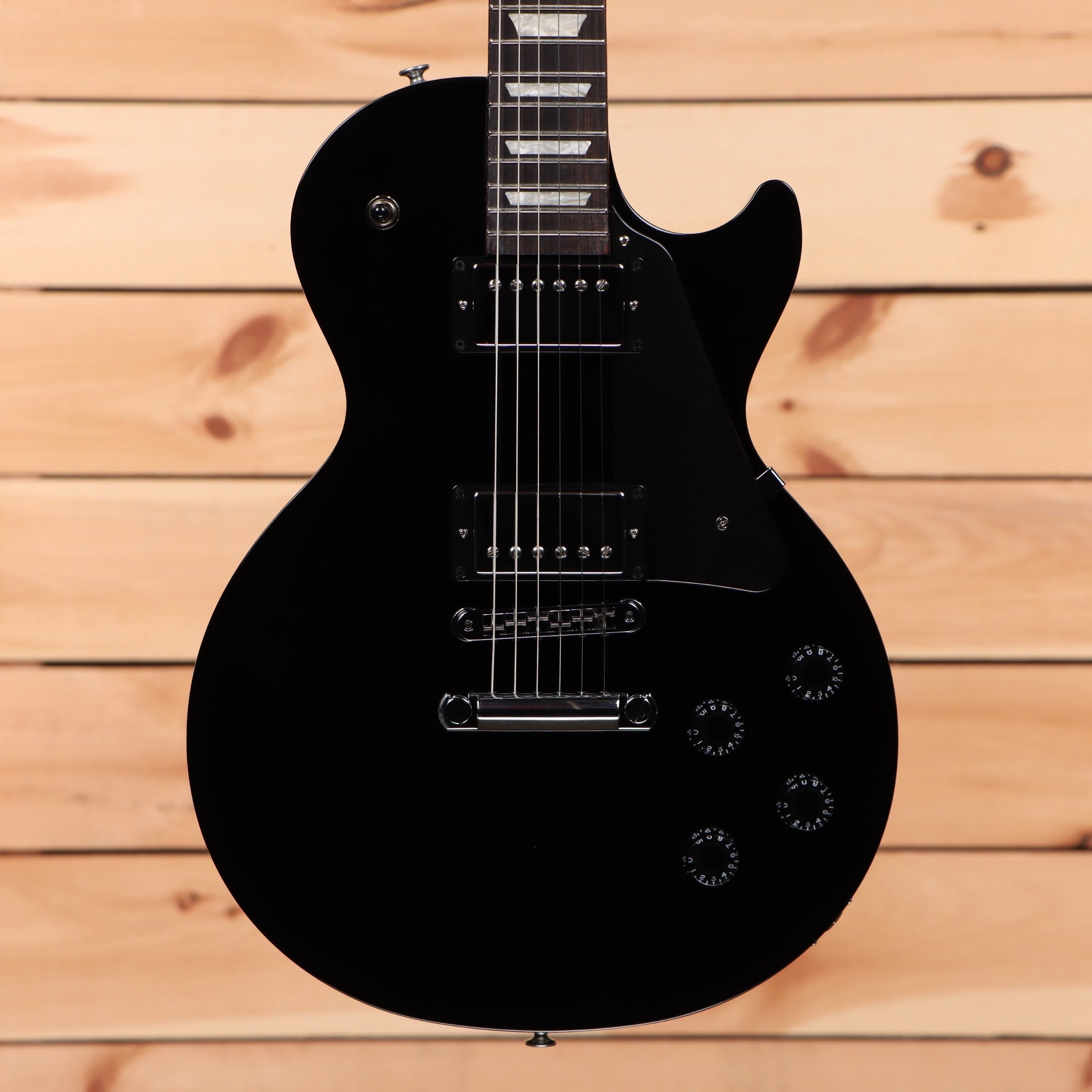Gibson Les Paul Studio Ebony electric guitar with dual humbuckers and semi-hollow body