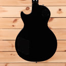 Gibson Les Paul Studio Ebony electric guitar with dual humbucker pickups and semi-hollow body design
