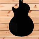 Gibson Les Paul Studio Ebony electric guitar with dual humbucker pickups and semi-hollow body design