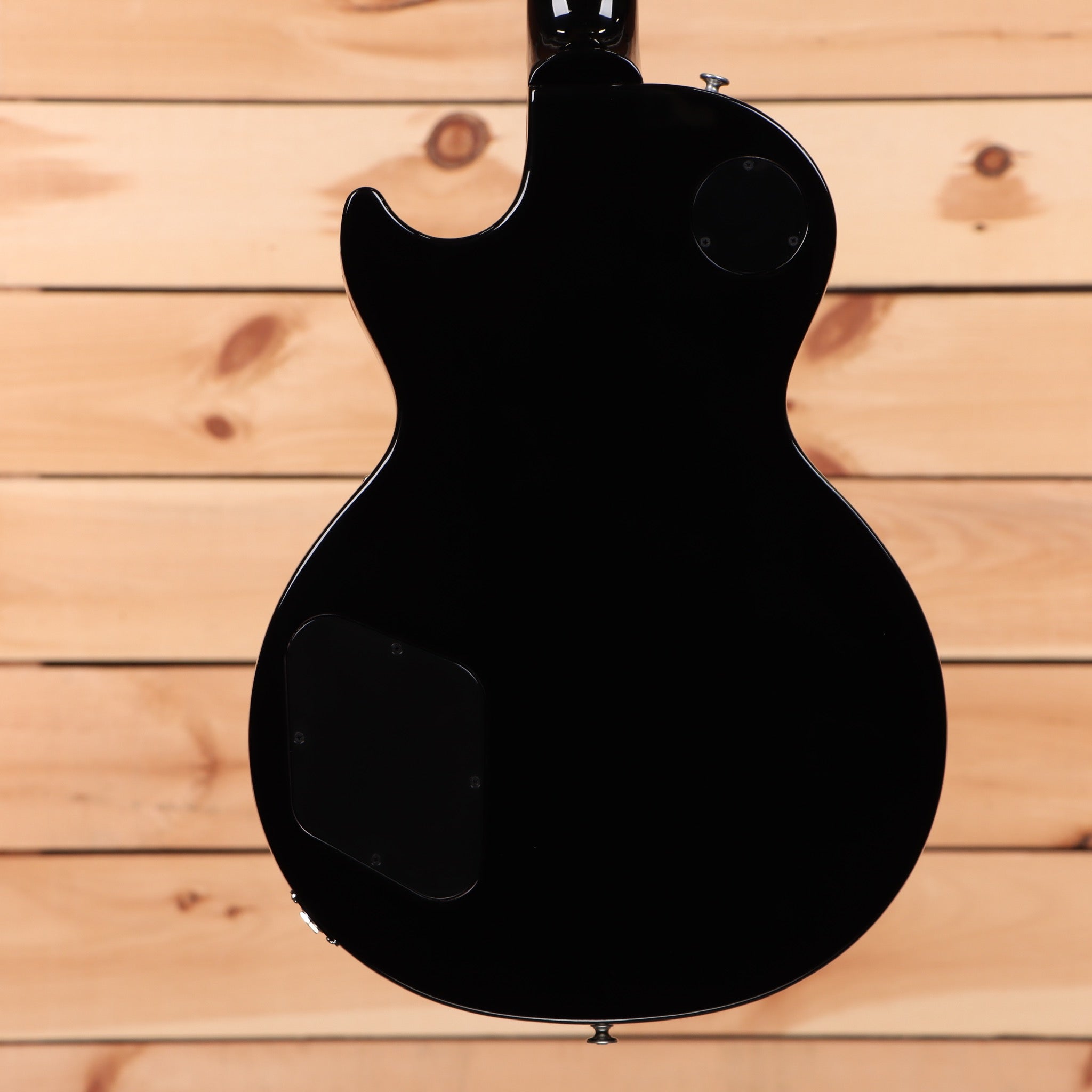 Gibson Les Paul Studio Ebony electric guitar with dual humbucker pickups and semi-hollow body design