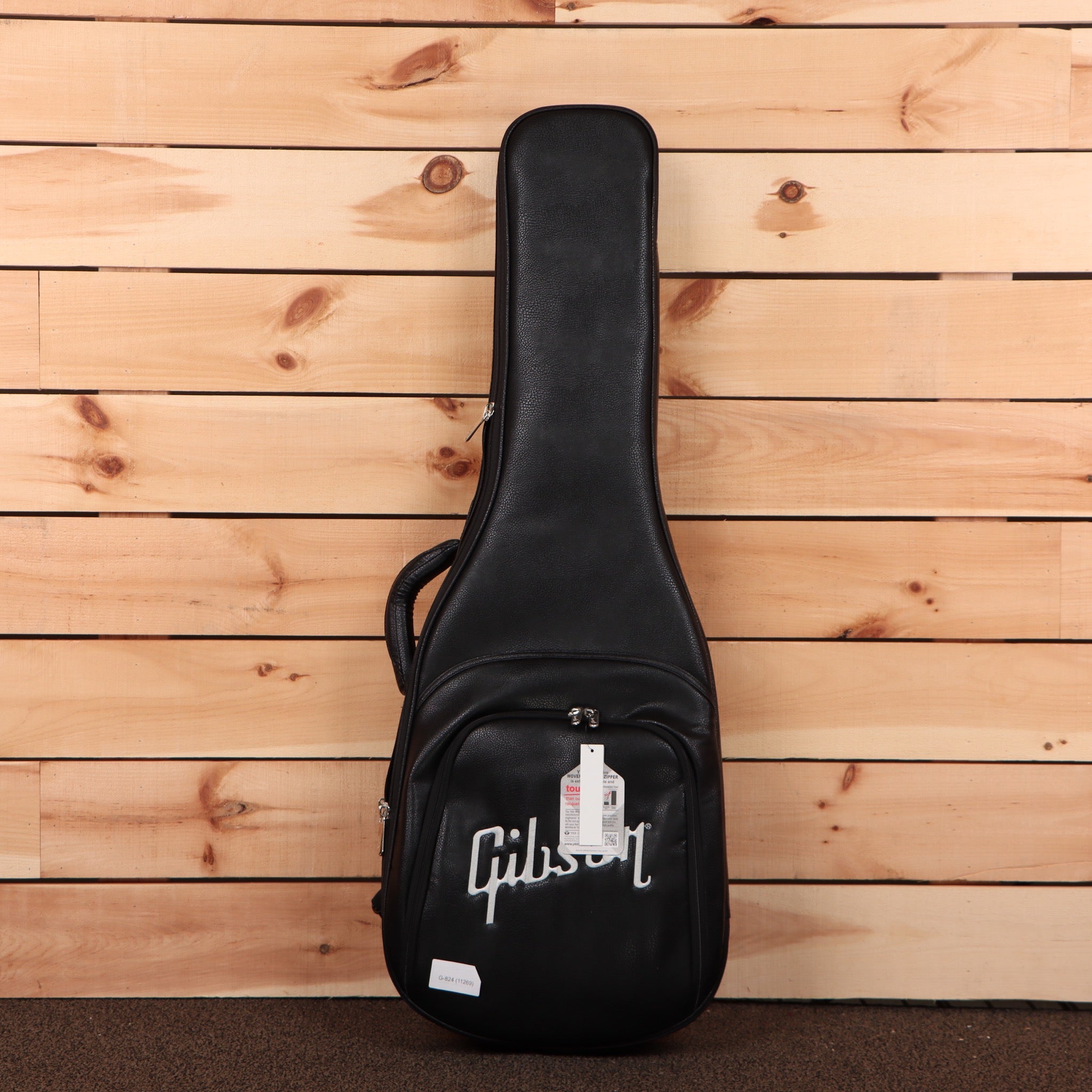 Gibson Les Paul Studio Ebony electric guitar case with shoulder strap and storage pockets