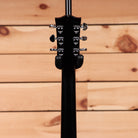 Gibson Les Paul Studio Ebony electric guitar with chrome hardware and dual humbuckers headstock view