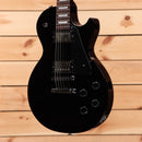 Gibson Les Paul Studio Ebony electric guitar with dual humbucker pickups and semi-hollow body design