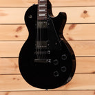 Gibson Les Paul Studio Ebony electric guitar with dual humbucker pickups and semi-hollow body design