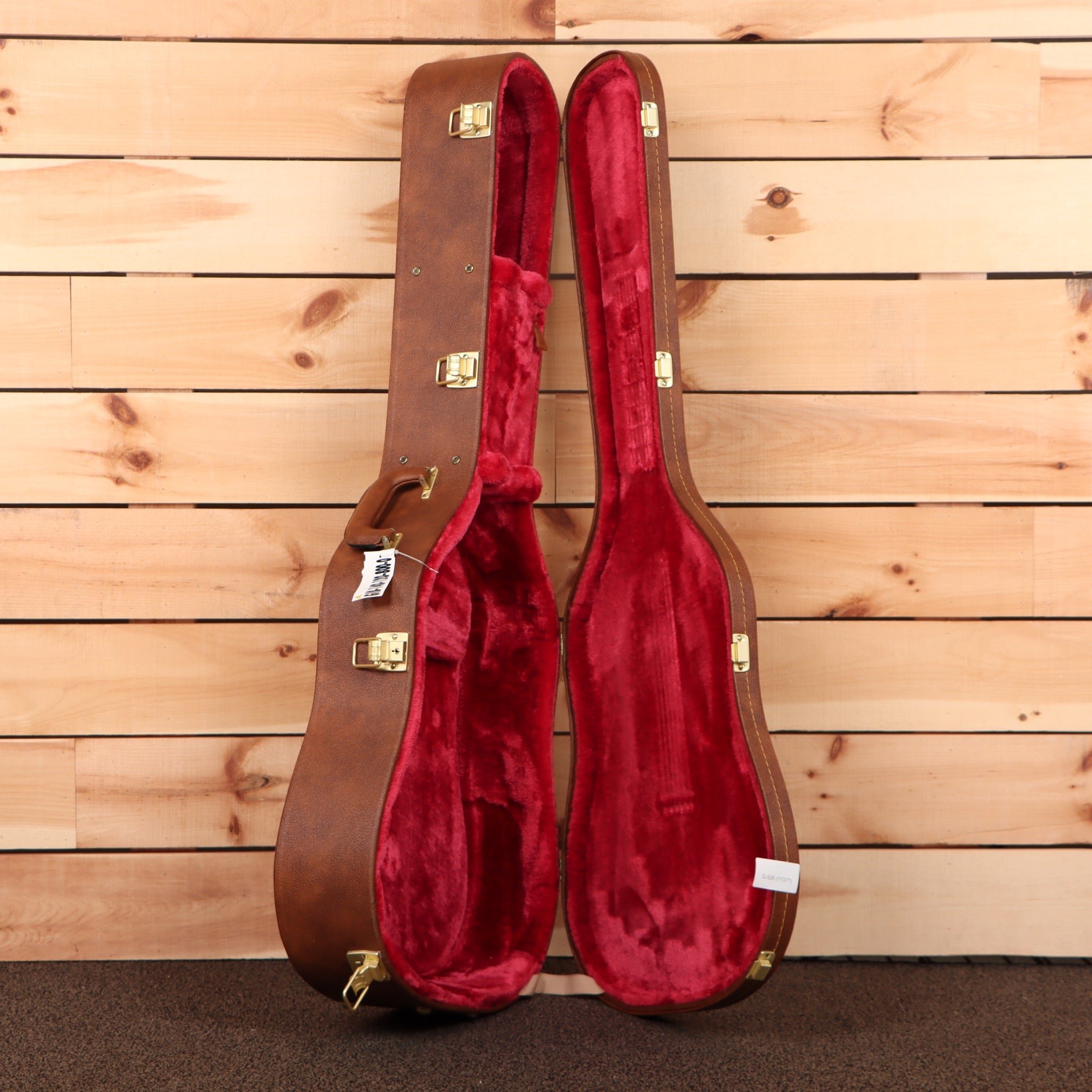 Gibson Hummingbird Original acoustic guitar Heritage Cherry Sunburst with brown leather case and red velvet interior