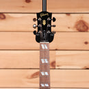 Gibson Hummingbird Studio Walnut acoustic guitar with block inlays and chrome tuning machines