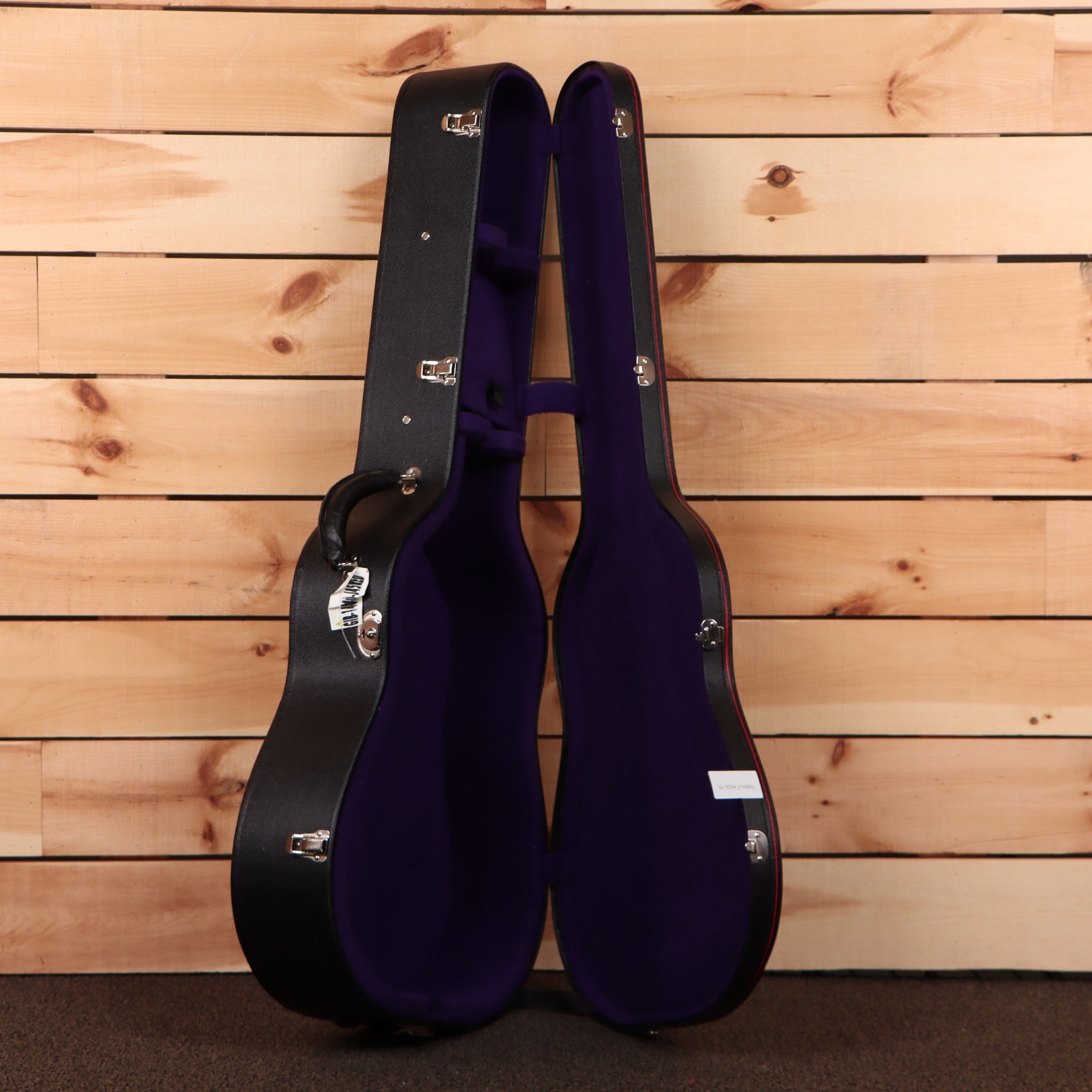 Gibson J-35 acoustic guitar vintage sunburst with purple interior hard case