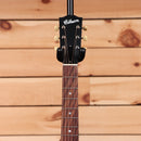 Gibson J-35 acoustic guitar Vintage Sunburst with rosewood fretboard and cream tuning pegs