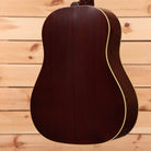 Gibson J-35 dreadnought acoustic guitar vintage sunburst with cream binding and solid wood construction