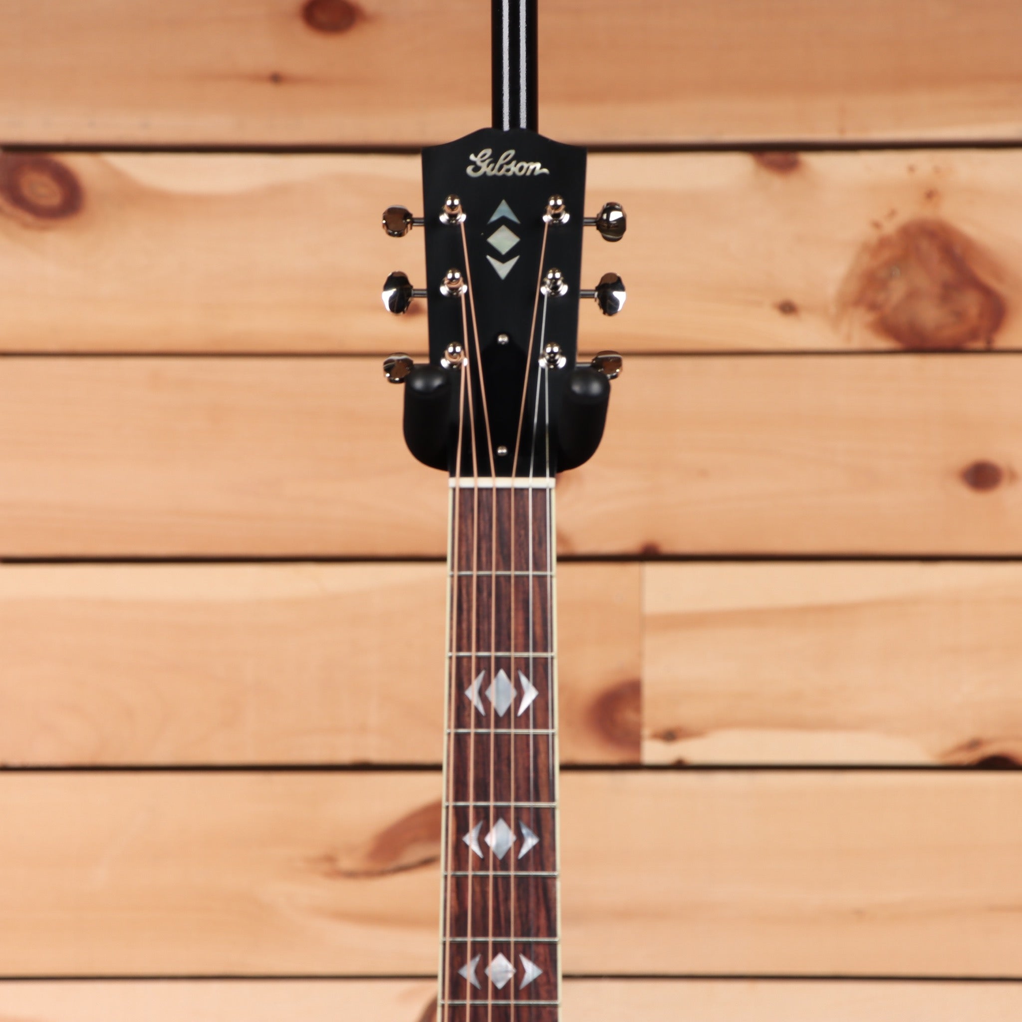 Gibson Advanced Jumbo acoustic guitar vintage sunburst with inlaid diamond fretboard markers