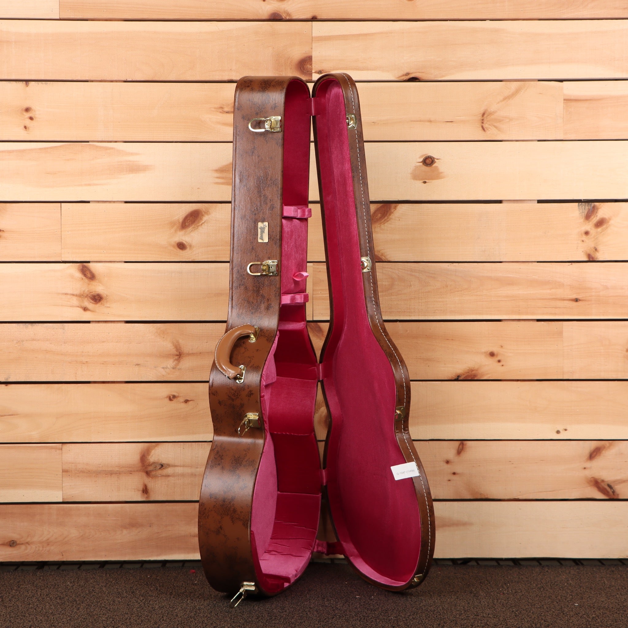 Gibson 1957 SJ200 jumbo acoustic guitar Antique Natural with burgundy velvet-lined case