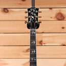 Gibson Doves in Flight acoustic guitar Antique Natural with inlaid bird fretboard inlays and gold tuners