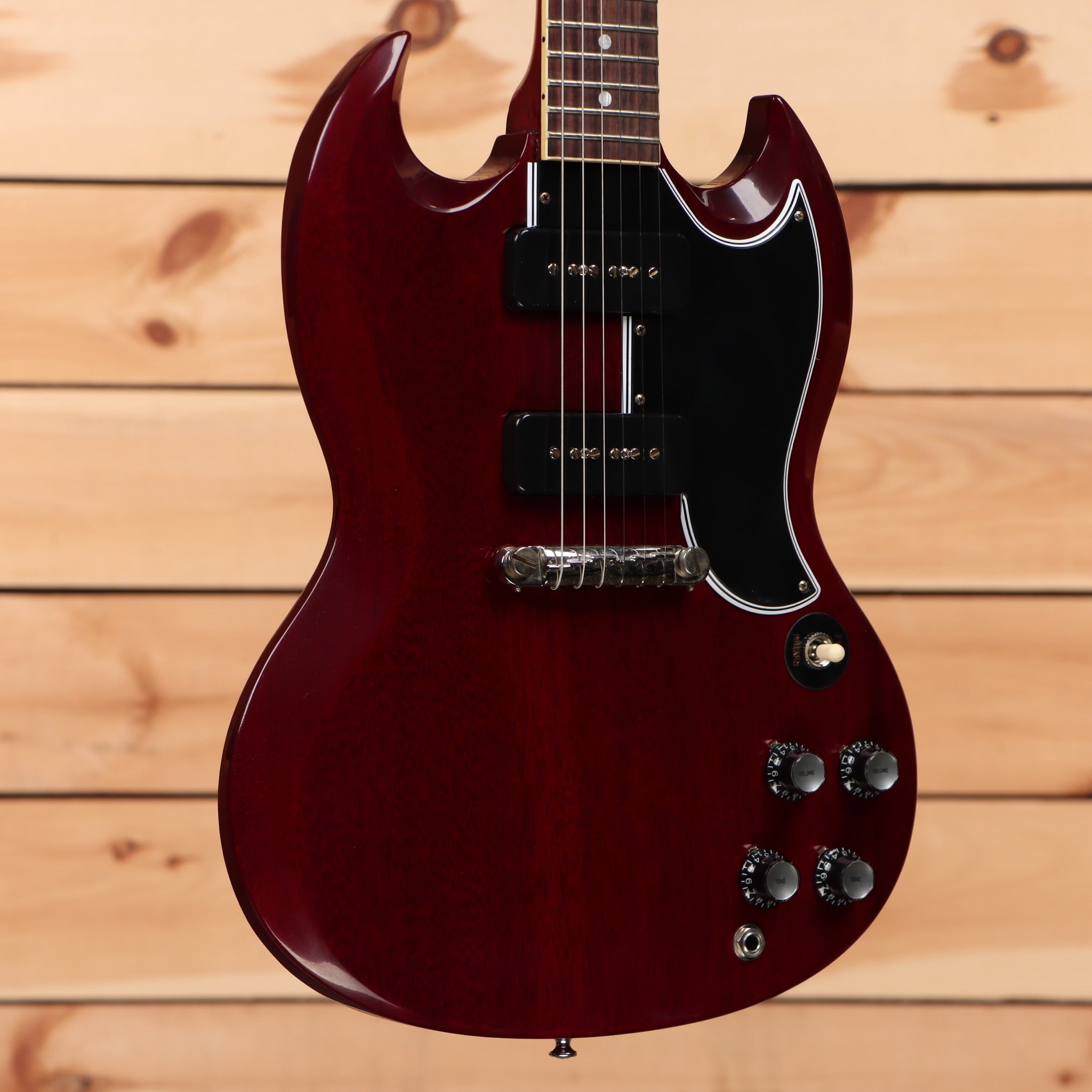 Gibson 1963 SG Special Reissue electric guitar cherry red with dual humbuckers and black pickguard