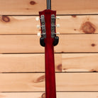 Gibson 1963 SG Special Reissue electric guitar cherry red with dual humbuckers and pearl tuning pegs