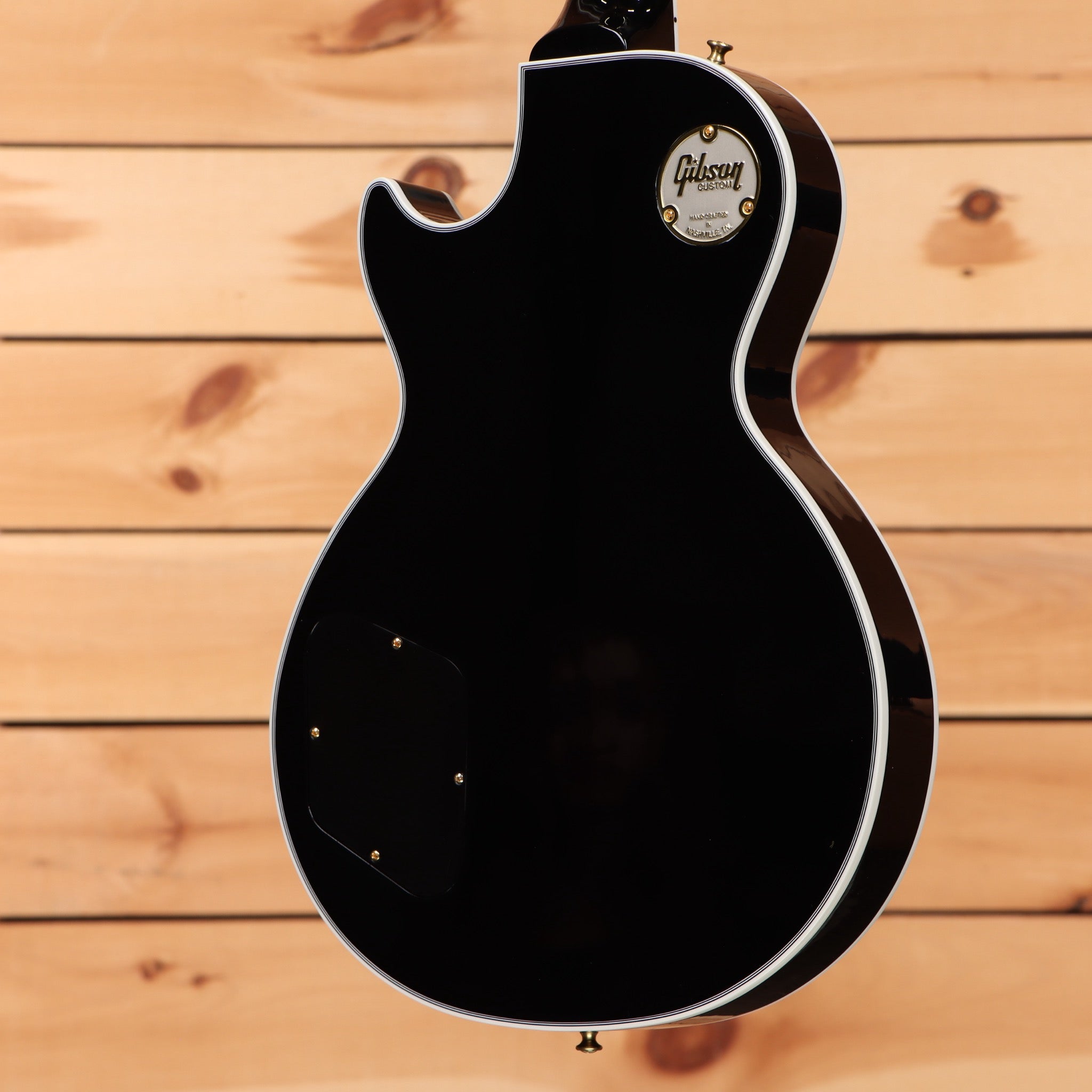 Gibson Les Paul Custom electric guitar Ebony semi-hollow body with white binding and gold hardware
