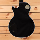 Gibson Les Paul Custom ebony electric guitar with gold hardware and binding