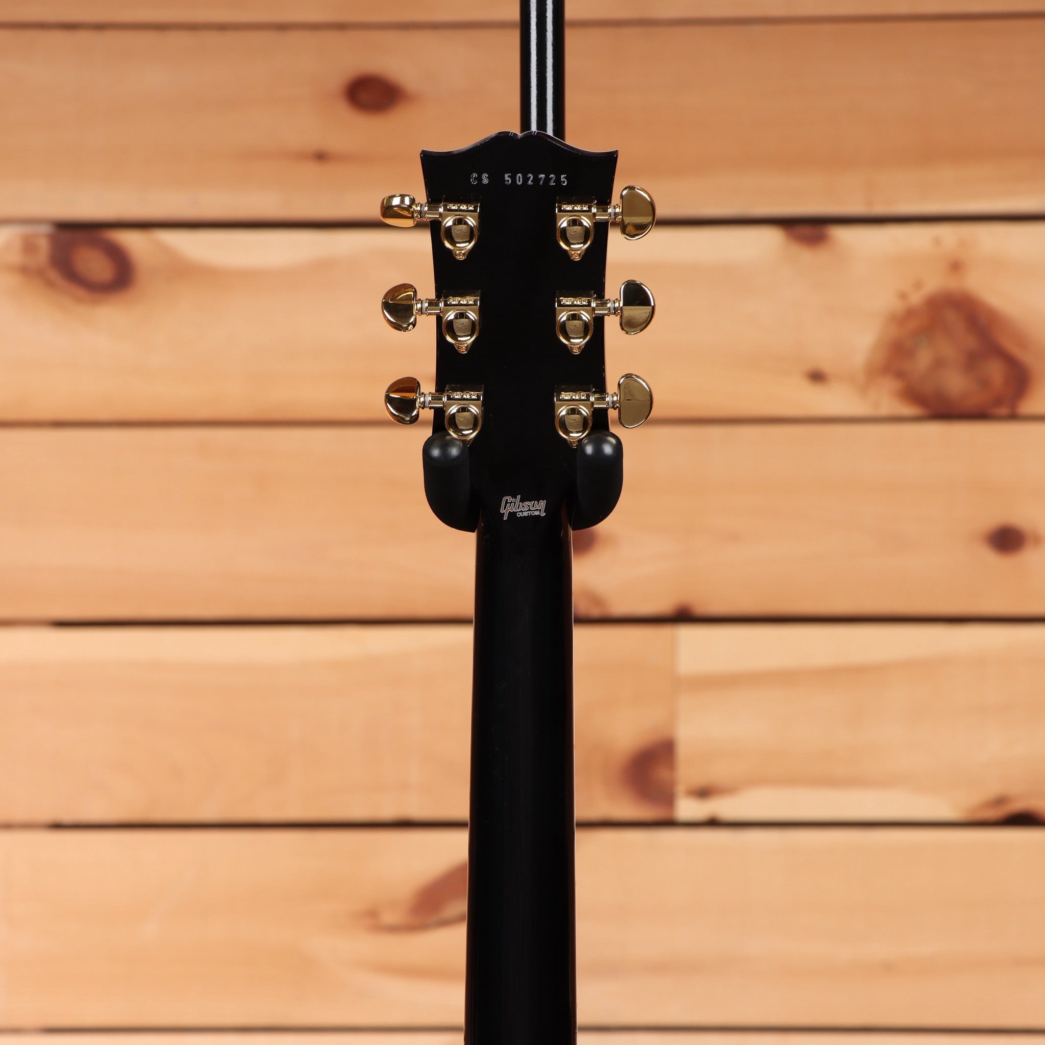 Gibson Les Paul Custom ebony electric guitar with gold hardware and dual humbuckers