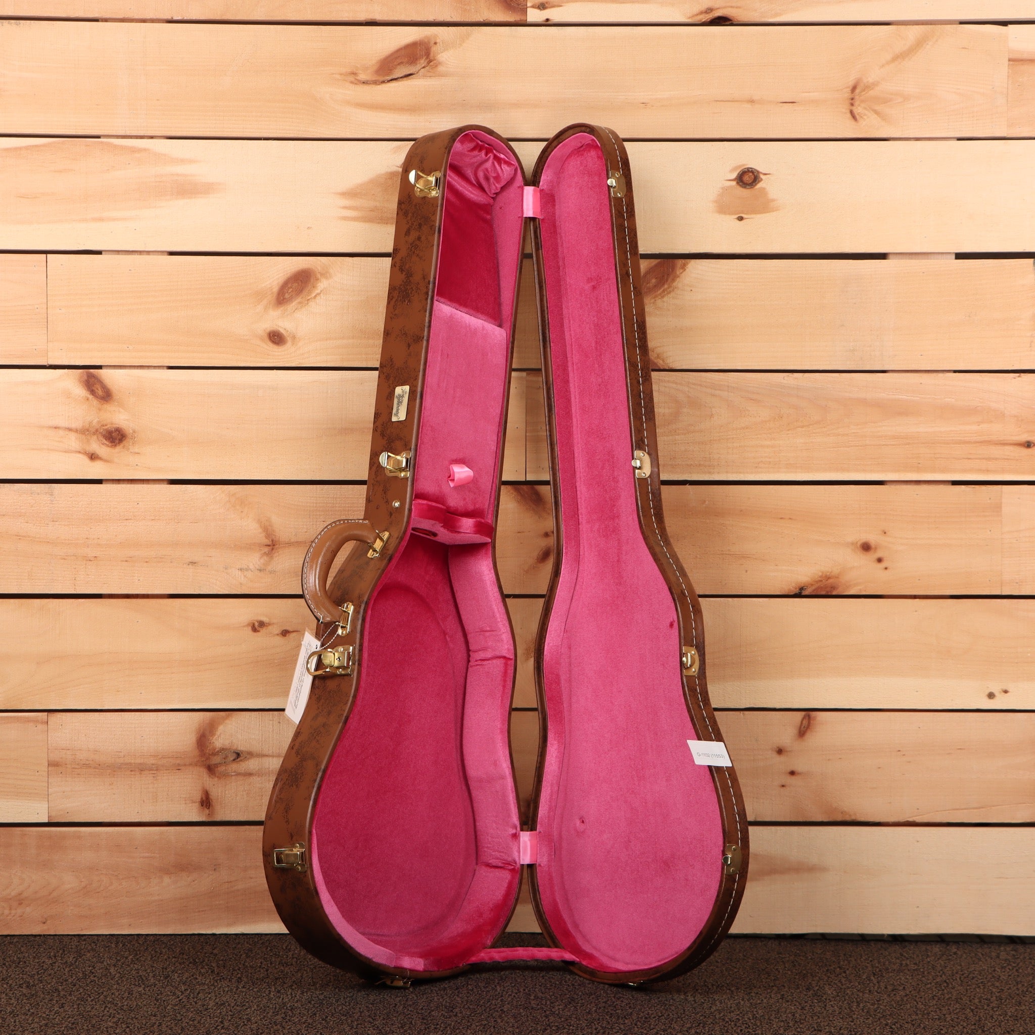 Gibson 1959 Les Paul Standard Reissue Ultra Light Aged Factory Burst electric guitar with pink velvet case