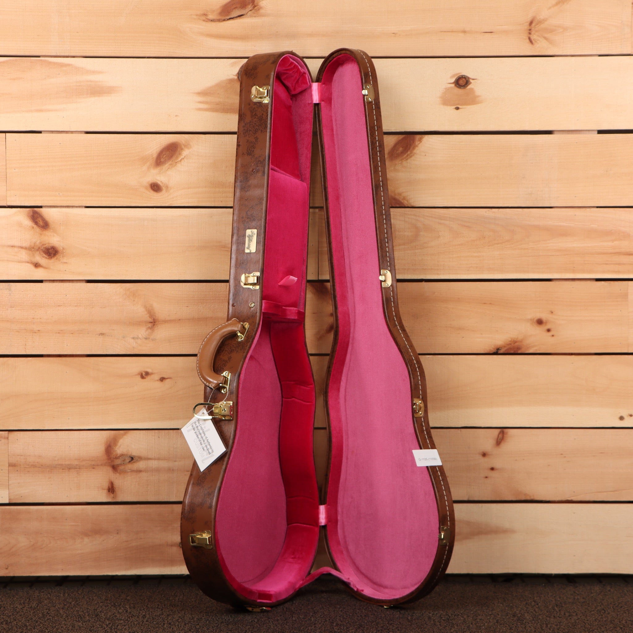 Gibson 1959 Les Paul Standard Reissue Ultra Light Aged Sunrise Teaburst electric guitar with burgundy case