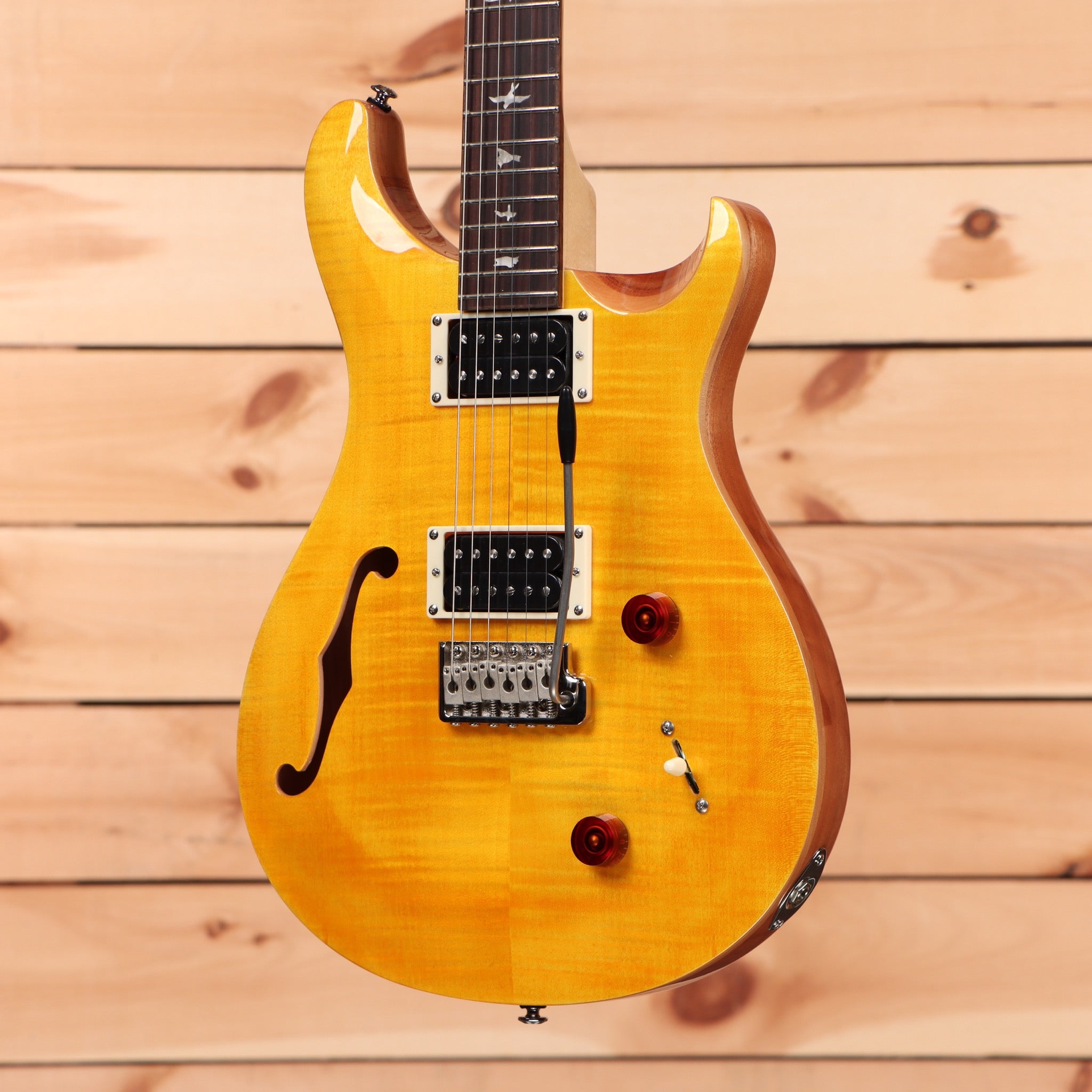 Paul Reed Smith SE Custom 22 semi-hollow electric guitar Santana Yellow with flamed maple top and dual humbuckers