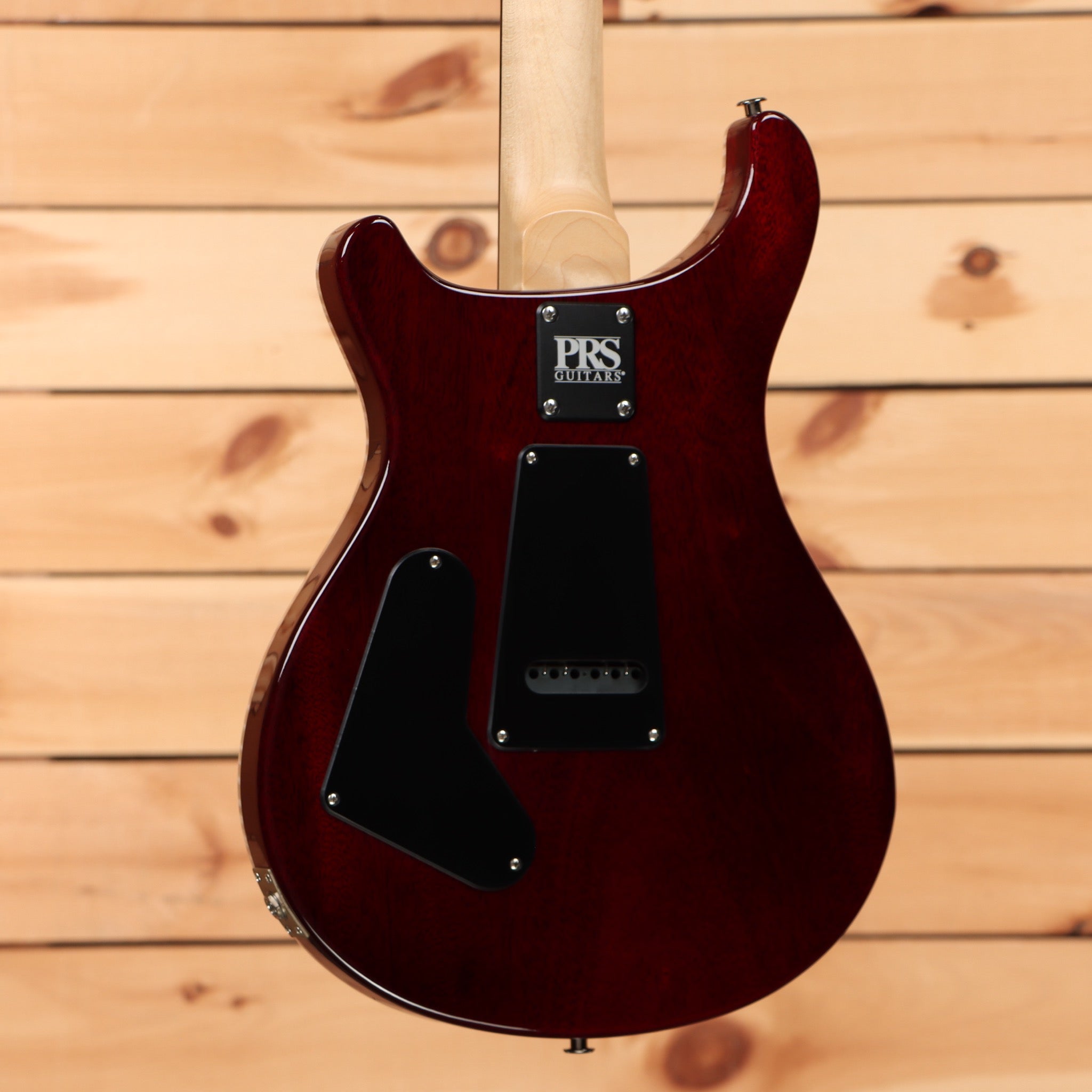 Paul Reed Smith CE 24 Fire Red Burst electric guitar with dual humbucker pickups and maple neck