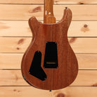 Paul Reed Smith Studio electric guitar antique white finish with humbucker pickups and curved body cutaway