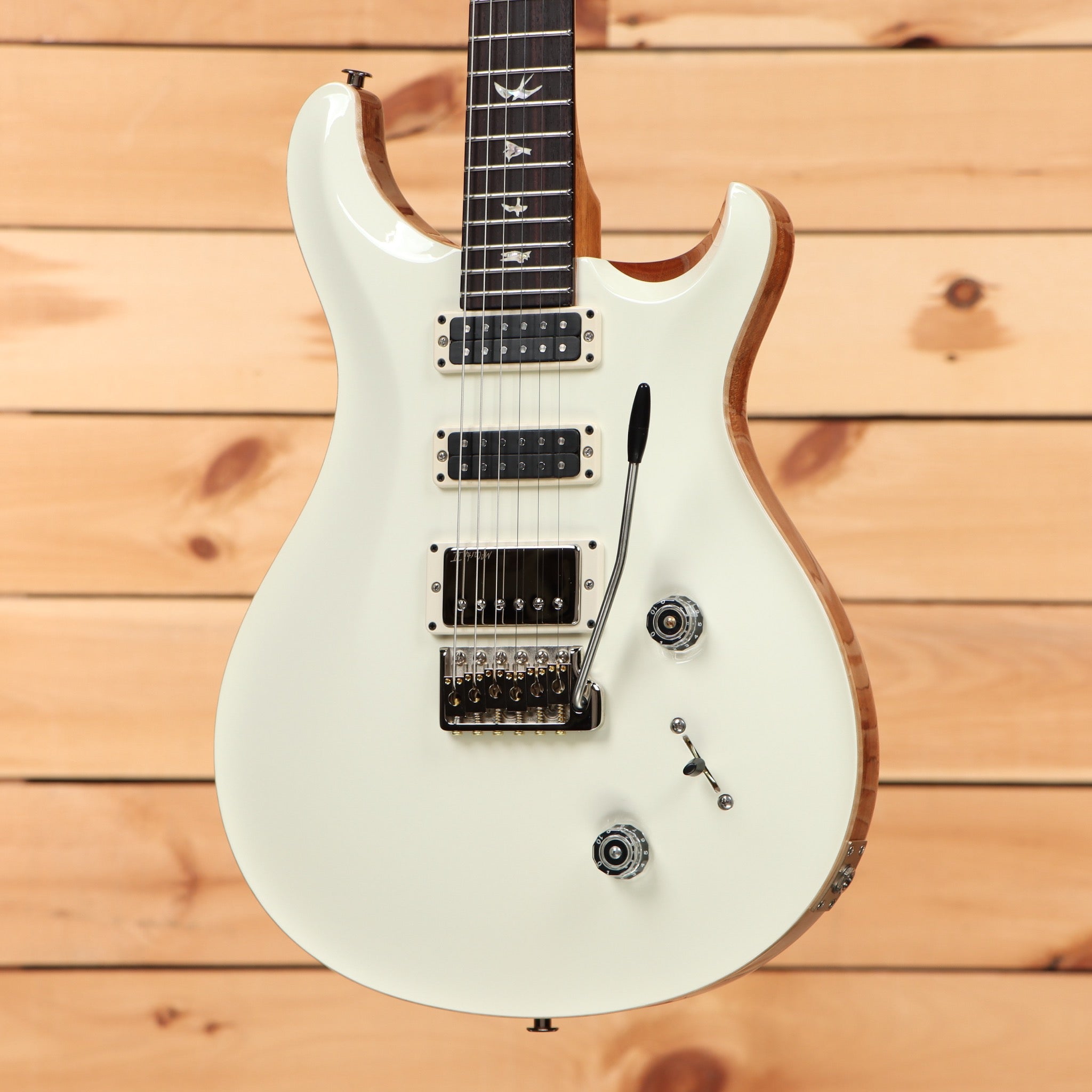 Paul Reed Smith Studio electric guitar Antique White with dual humbucker pickups and tremolo bridge