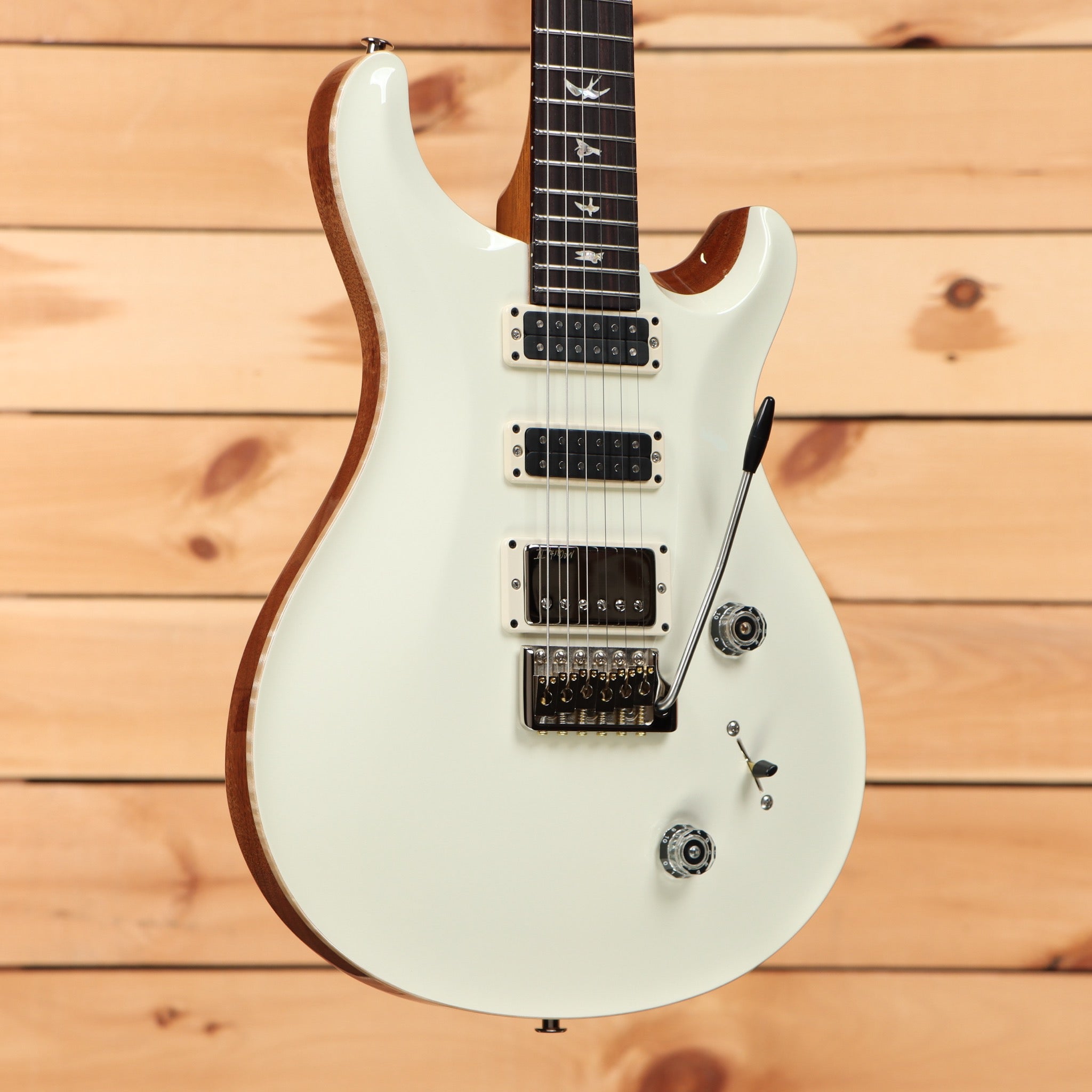Paul Reed Smith Studio electric guitar Antique White with dual humbucker pickups and tremolo bridge
