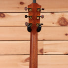 Taylor Custom Grand Auditorium acoustic guitar natural finish with gold tuning machines and black headstock