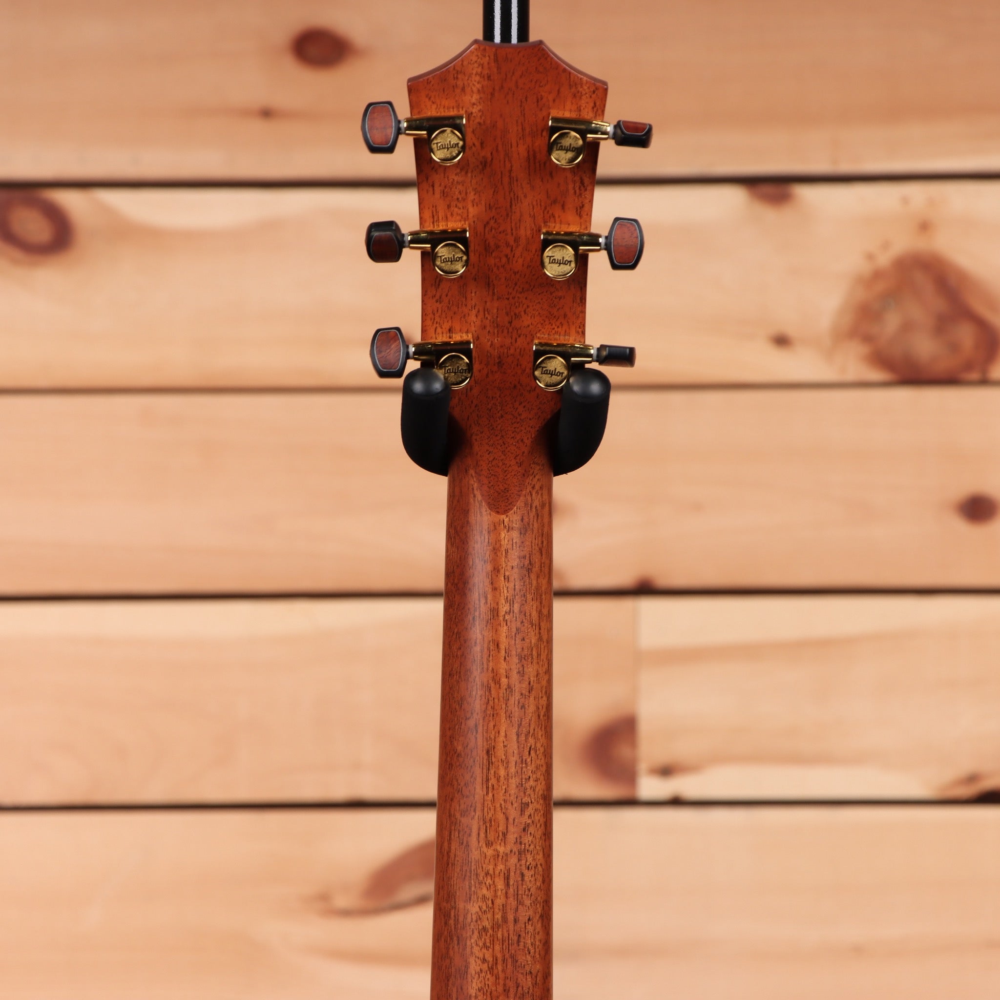 Taylor Custom Grand Auditorium acoustic guitar natural finish with gold tuning machines and black headstock