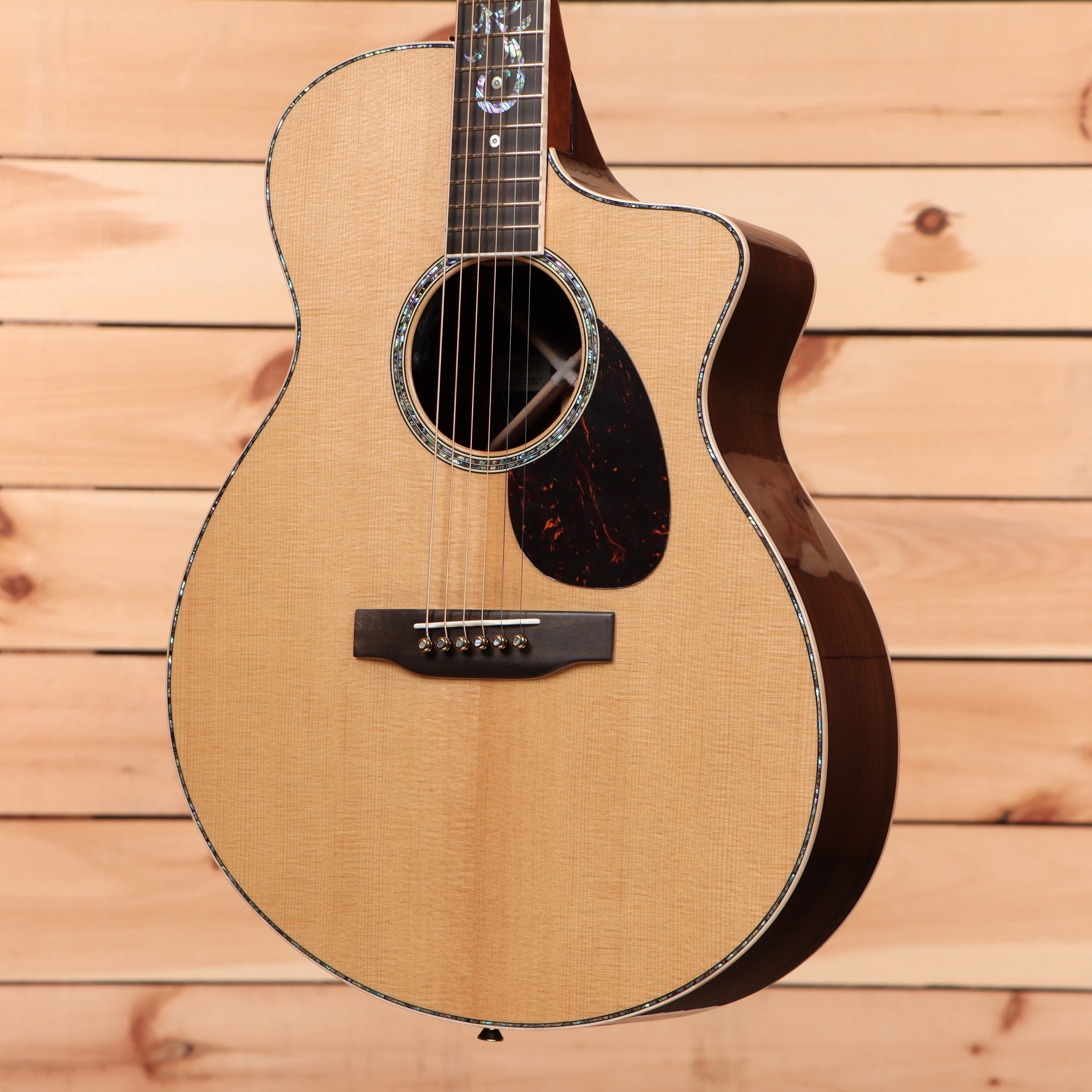 Martin Custom Shop SC natural acoustic guitar with venetian cutaway and inlaid rosette binding