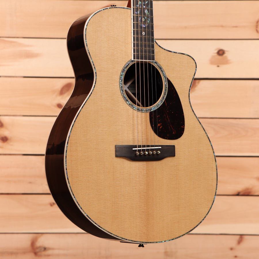 Martin Custom Shop SC natural acoustic guitar with venetian cutaway and abalone binding
