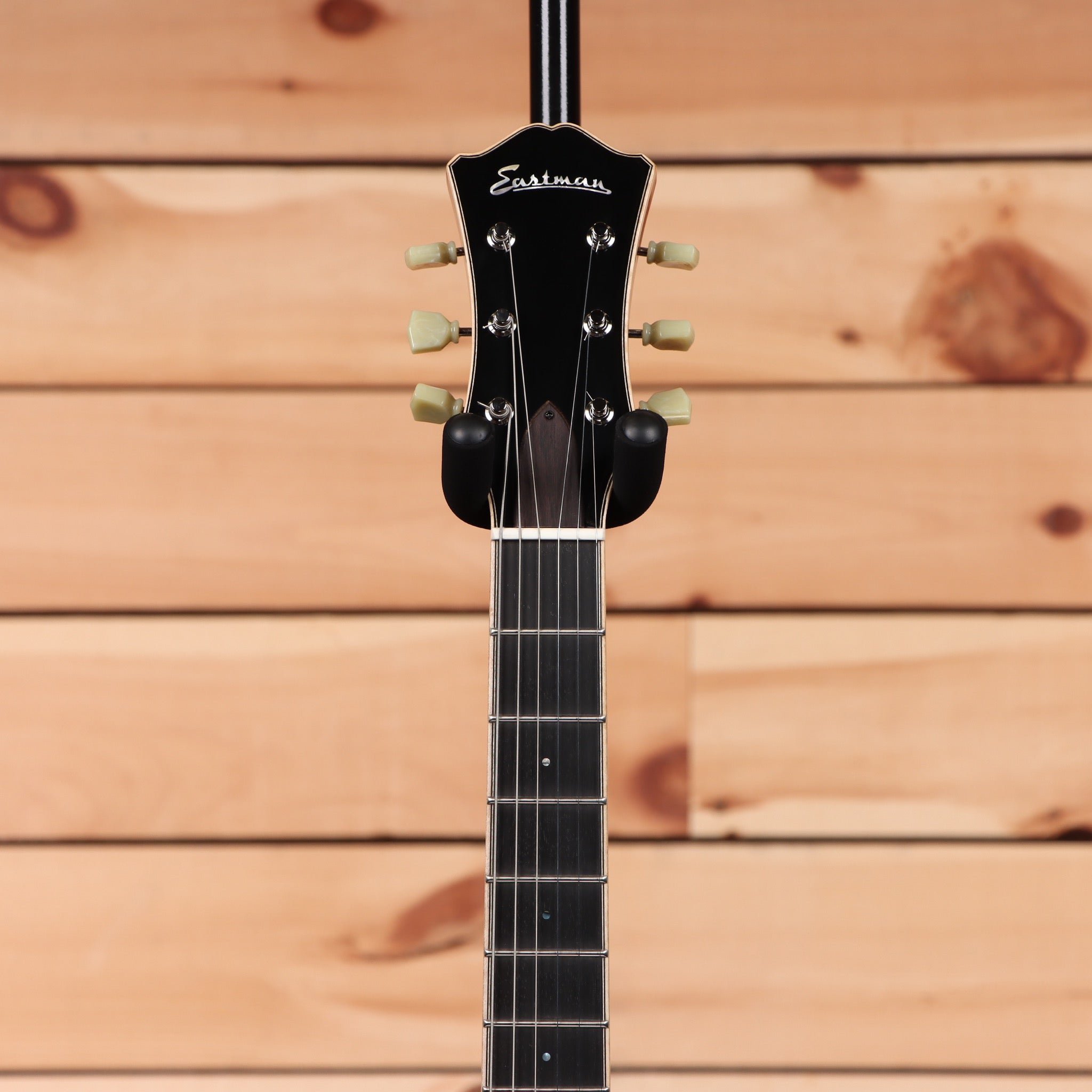 Eastman T186MX semi-hollow body electric guitar Goldburst with cream tuning pegs and f-holes