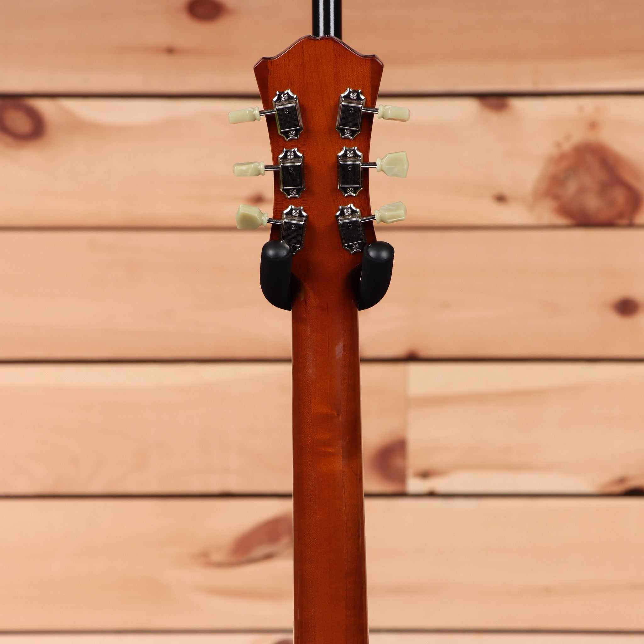 Eastman T186mx semi-hollow electric guitar Goldburst finish with cream tuning pegs and f-holes