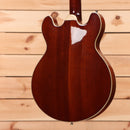 Eastman T184mx semi-hollow electric guitar Goldburst finish with cream binding and f-hole design