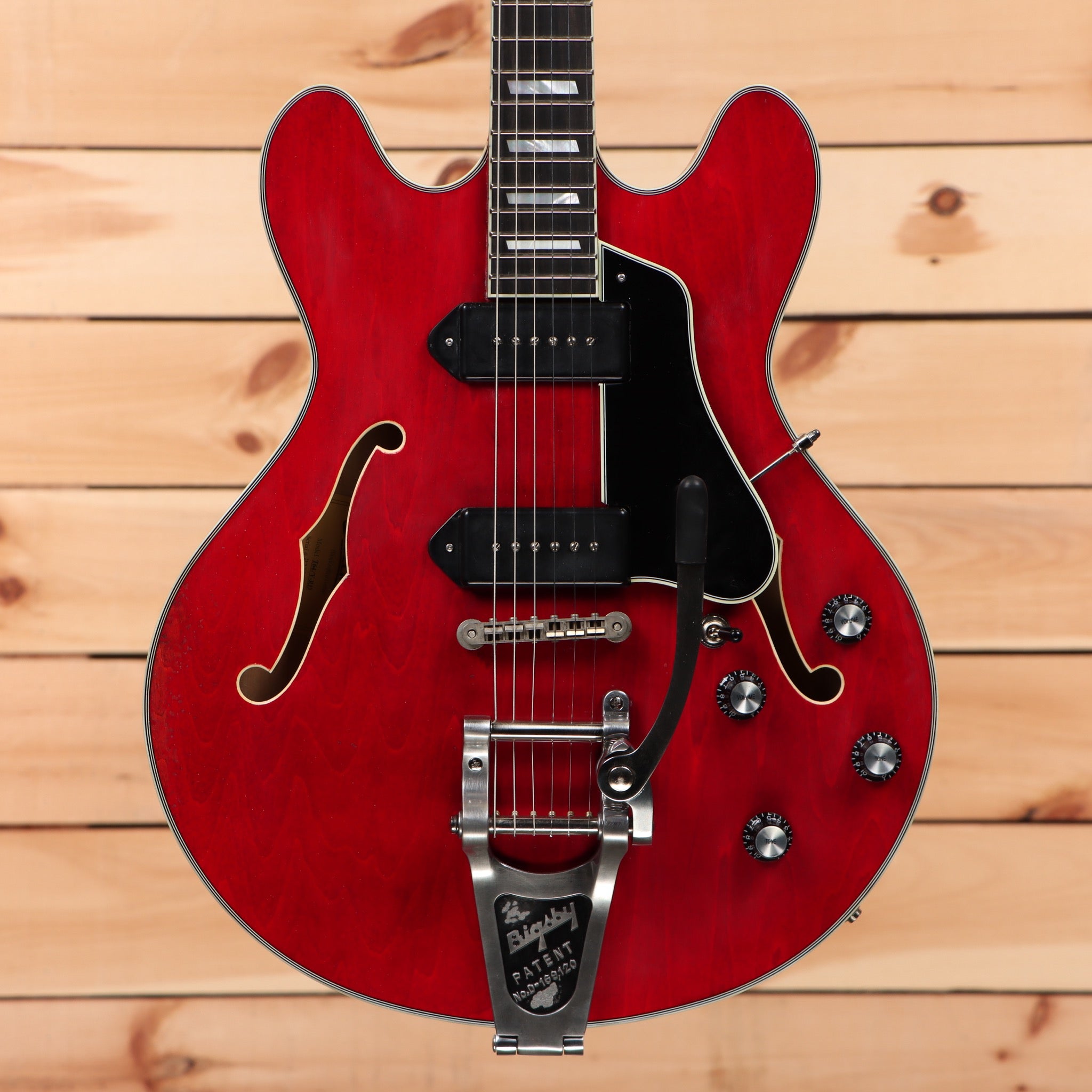 Eastman T64VRD semi-hollow electric guitar antique red with f-holes and bigsby tremolo