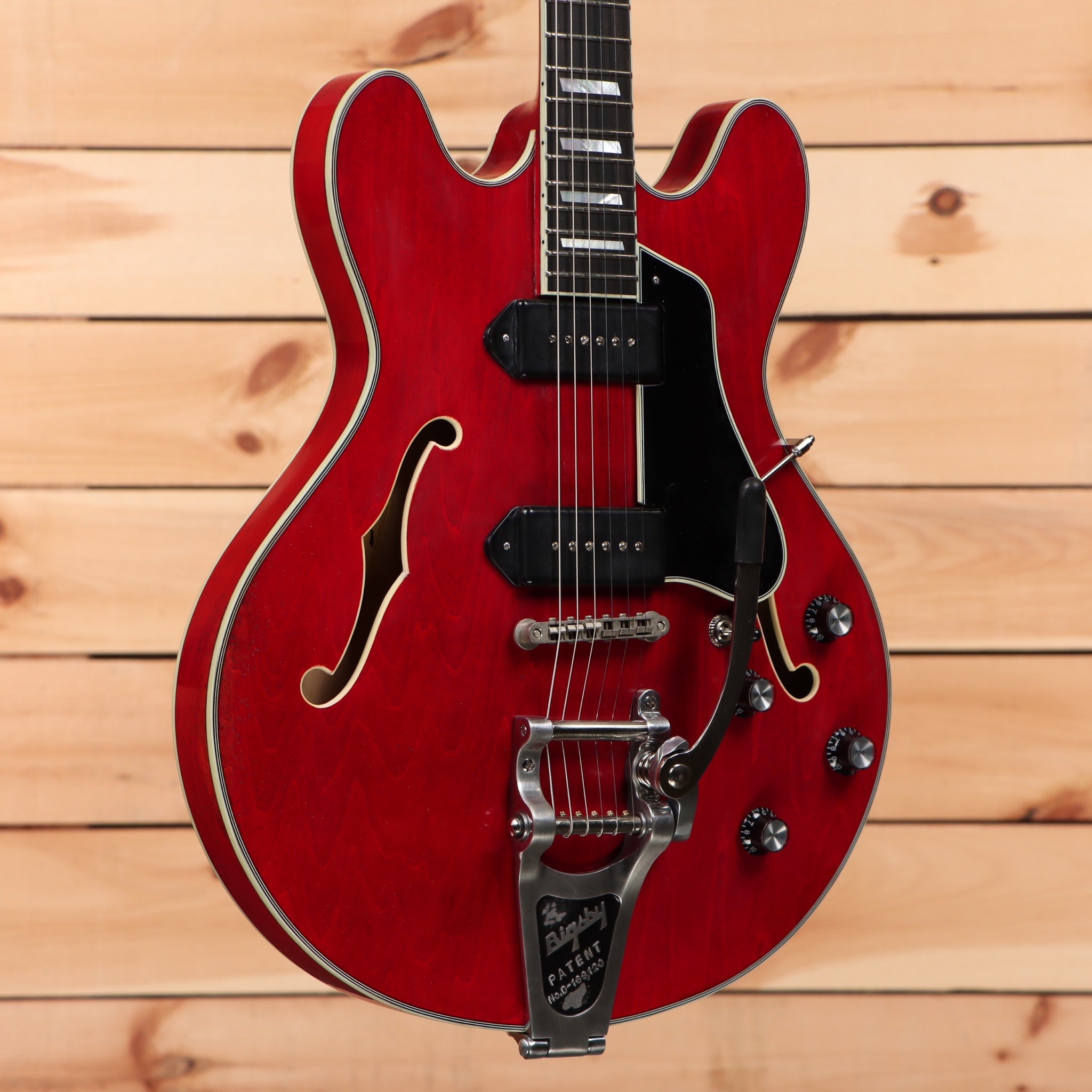 Eastman T64VRD semi-hollow body electric guitar Antique Red with f-holes and black pickguard