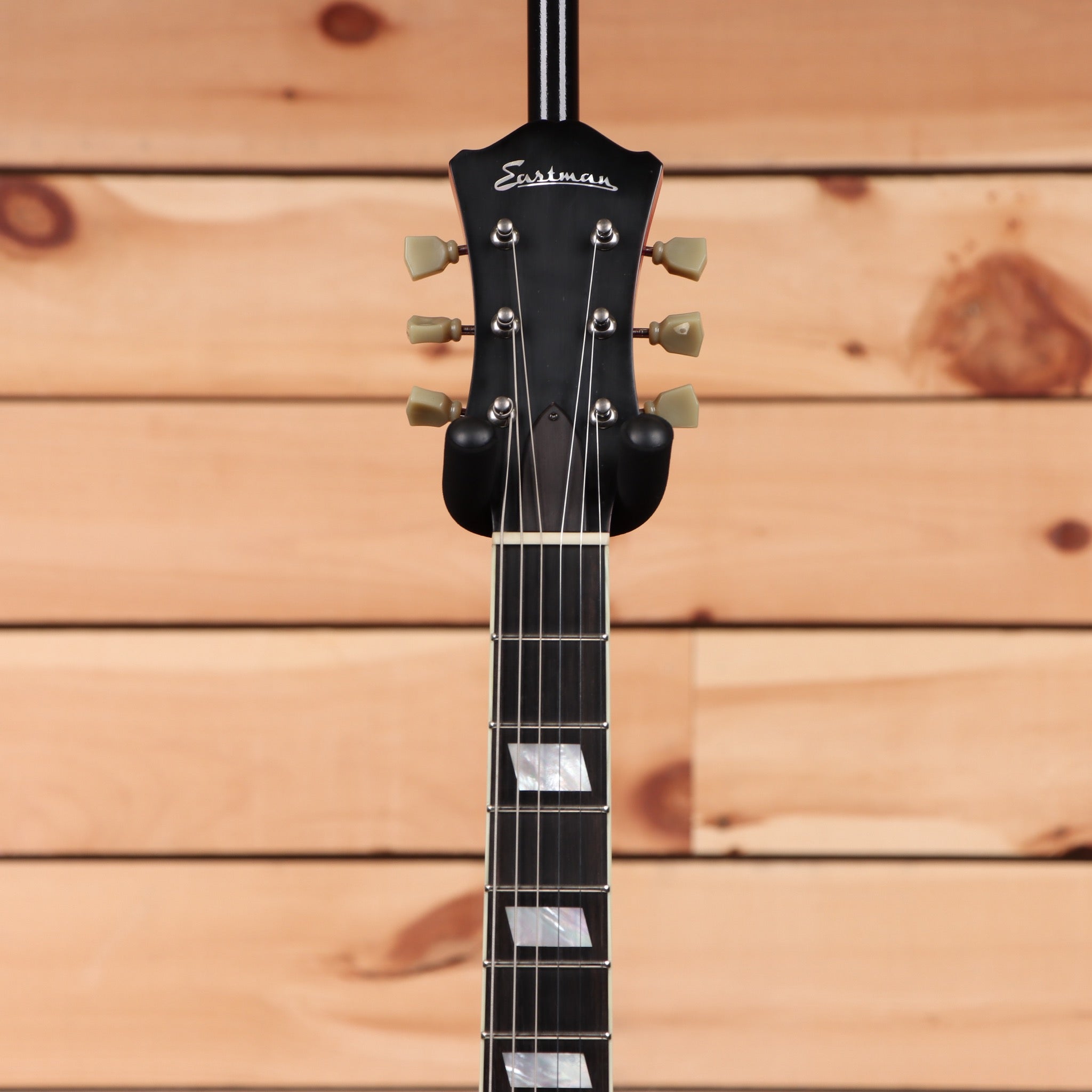 Eastman T64VRD semi-hollow electric guitar antique red with dual humbuckers and f-holes