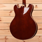 Eastman T186MX semi-hollow electric guitar Goldburst with white pickguard and f-hole cutaway