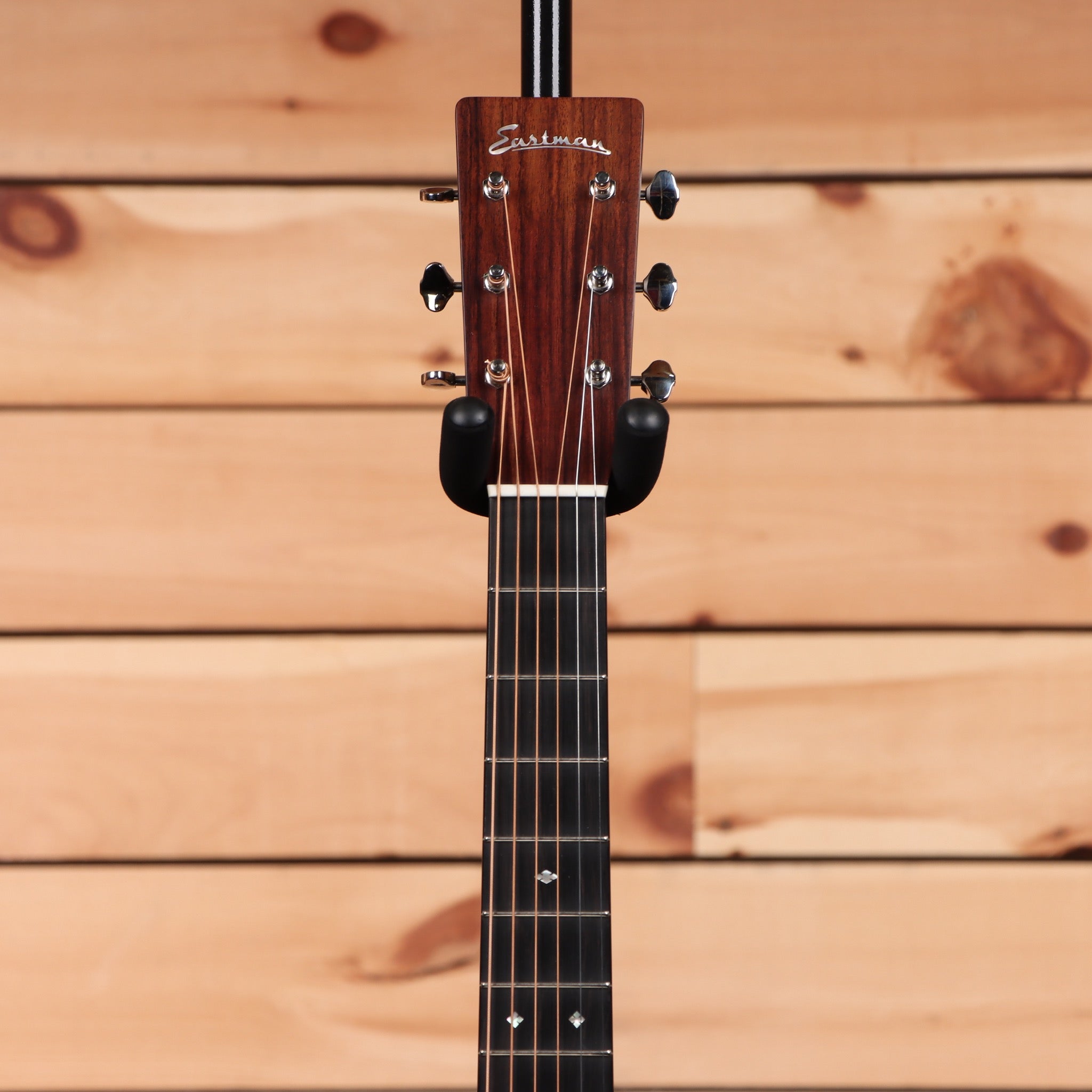 Eastman E20OM-TC acoustic guitar natural finish with rosewood fretboard and chrome tuning machines