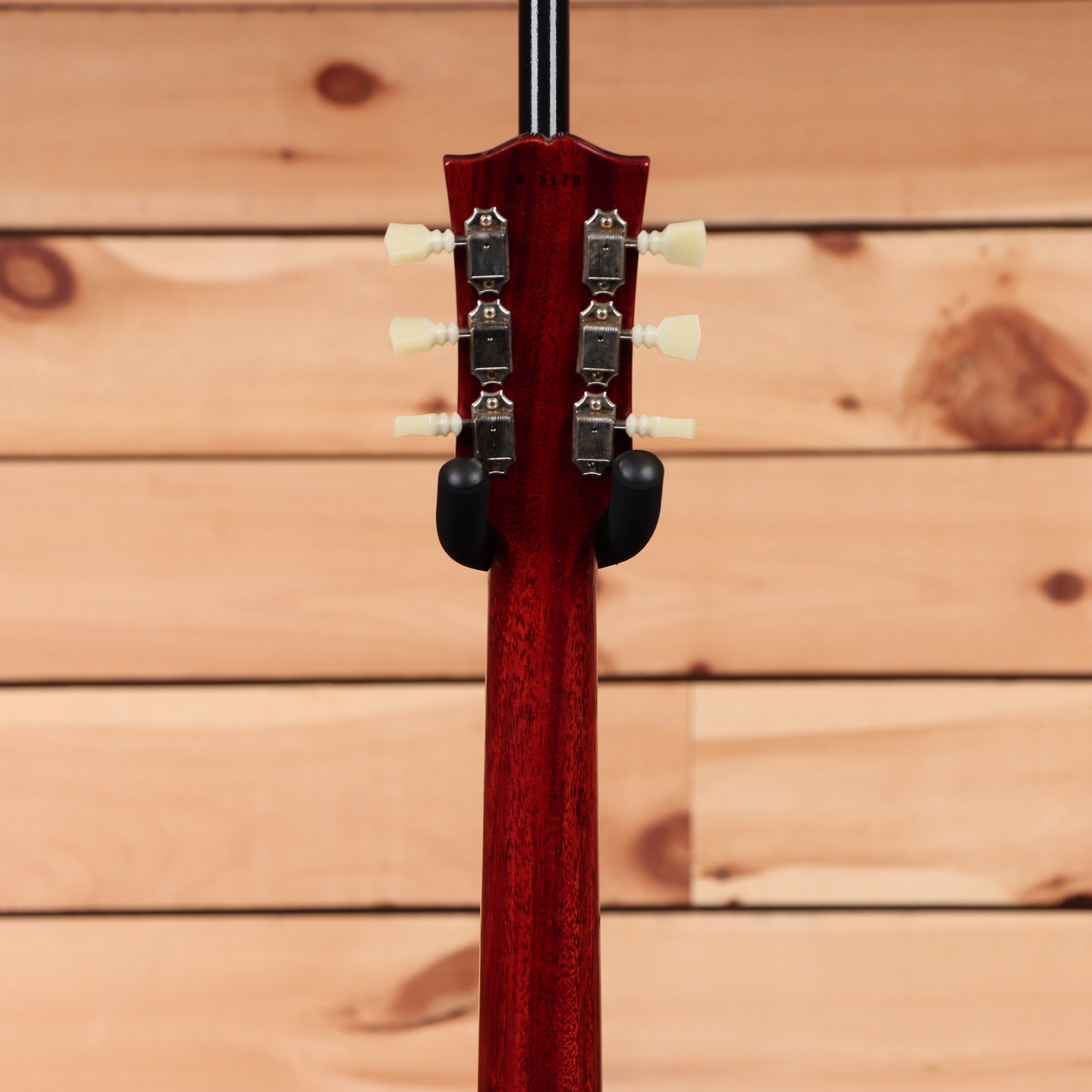 Gibson 1960 Les Paul Standard Reissue Ultra Light Aged electric guitar with dual humbuckers and cream tuning pegs