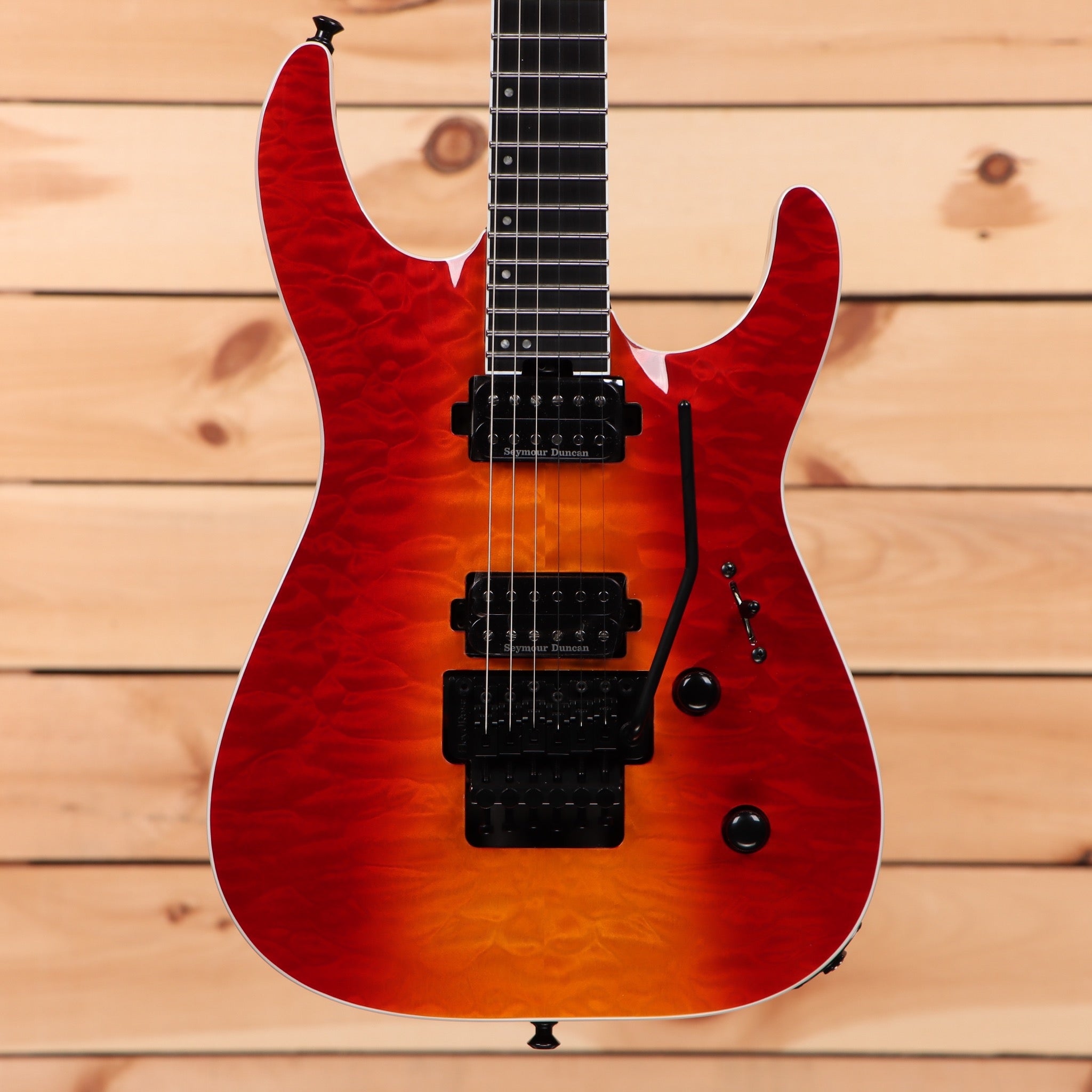 Jackson Pro Plus Series Dinky DKAQ electric guitar Firestorm with dual humbucker pickups