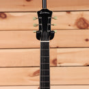 Eastman T184MX semi-hollow body electric guitar Goldburst with cream tuning pegs and f-holes