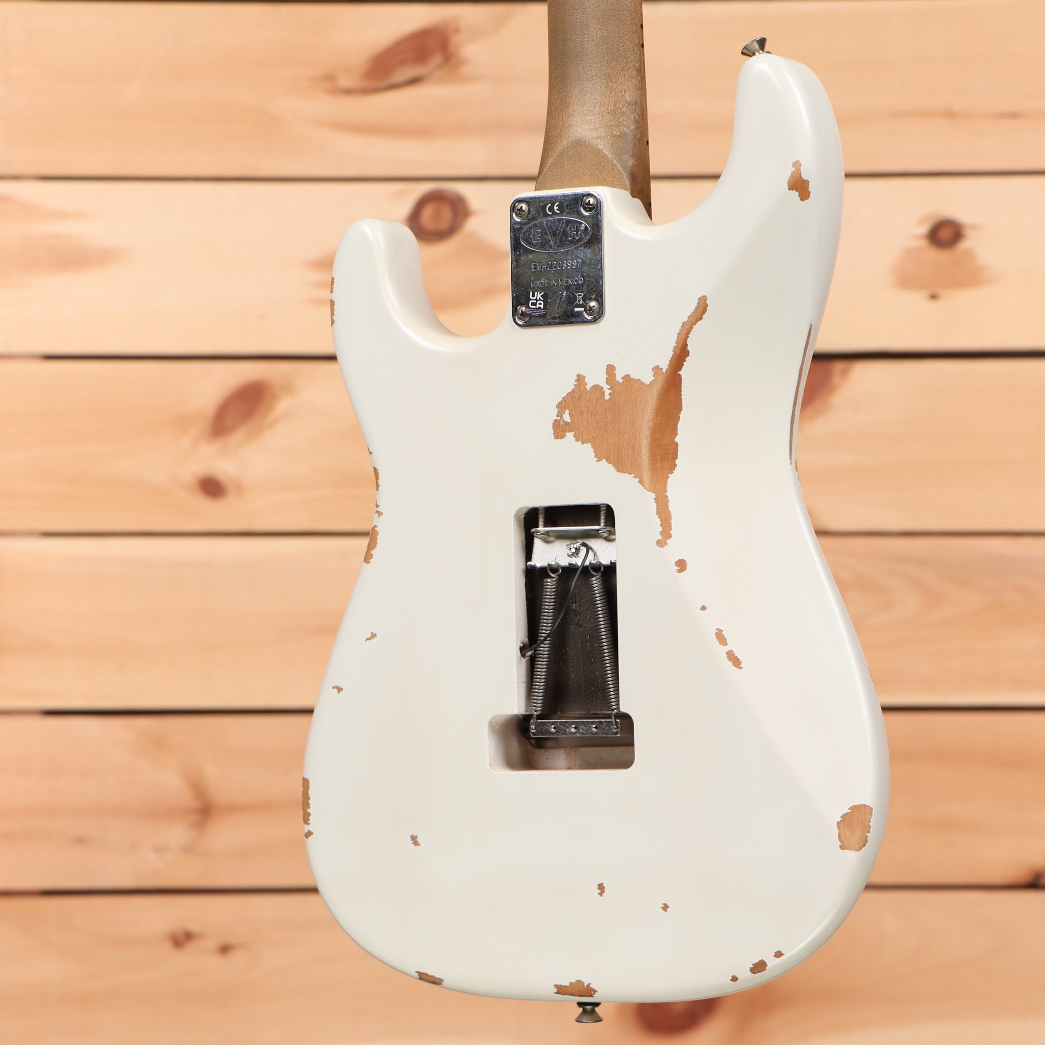 EVH Frankenstein Relic Series white electric guitar with heavily relic'd finish and single-coil pickups