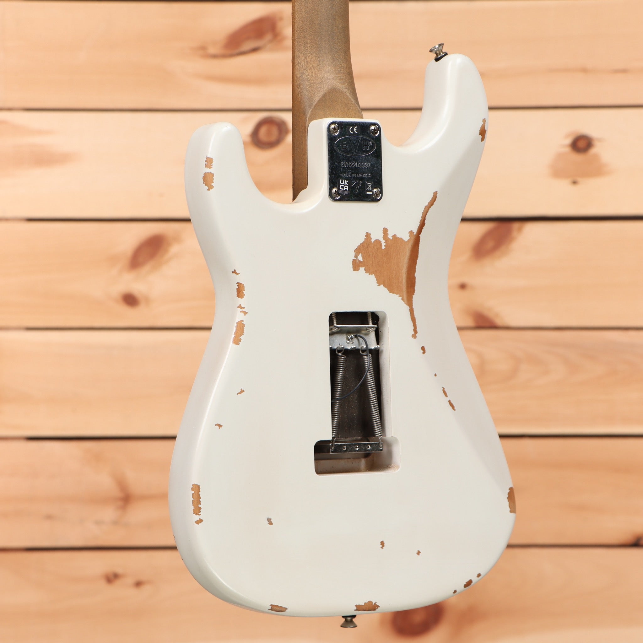 EVH Frankenstein Relic Series white electric guitar with distressed finish and tremolo bridge
