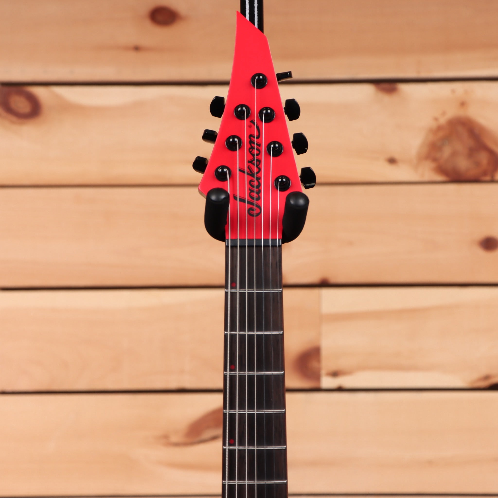 Jackson Pro Plus Series Dinky MDK7 HT electric guitar satin red with black bevels and humbucker pickups