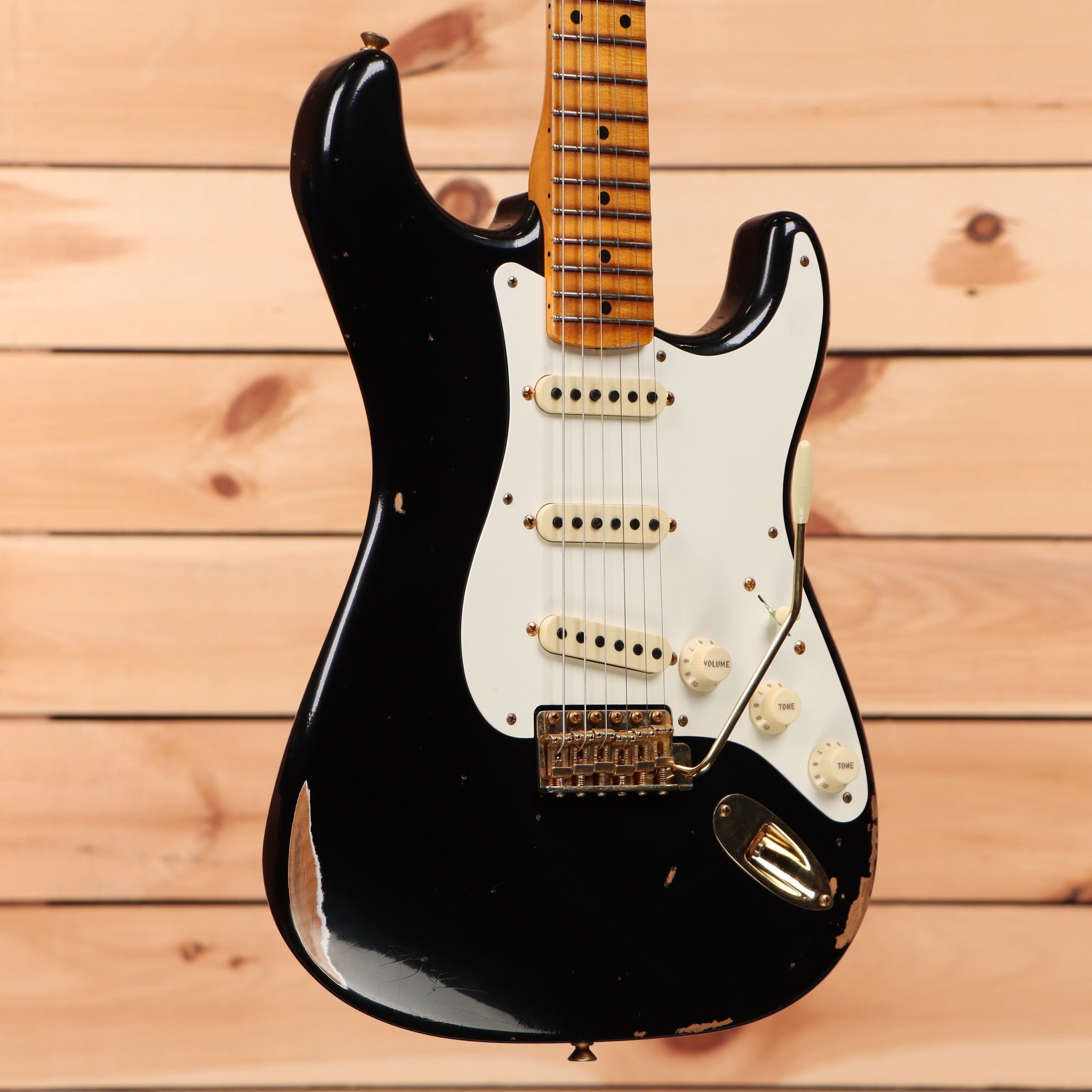 Fender Custom Shop Limited 1957 Stratocaster Relic electric guitar aged black with white pickguard and single-coil pickups