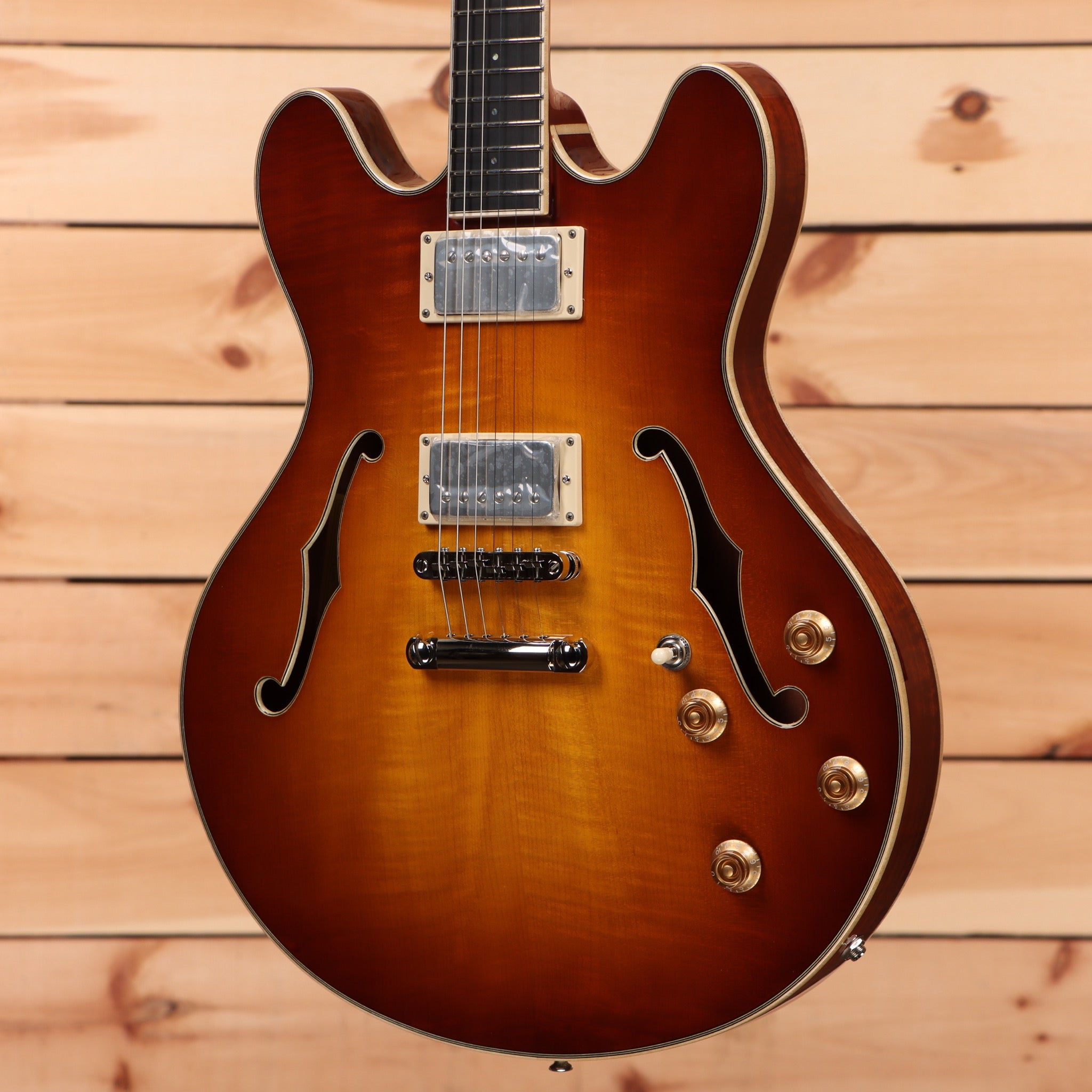 Eastman T186mx semi-hollow body electric guitar Goldburst with dual humbucker pickups and f-holes
