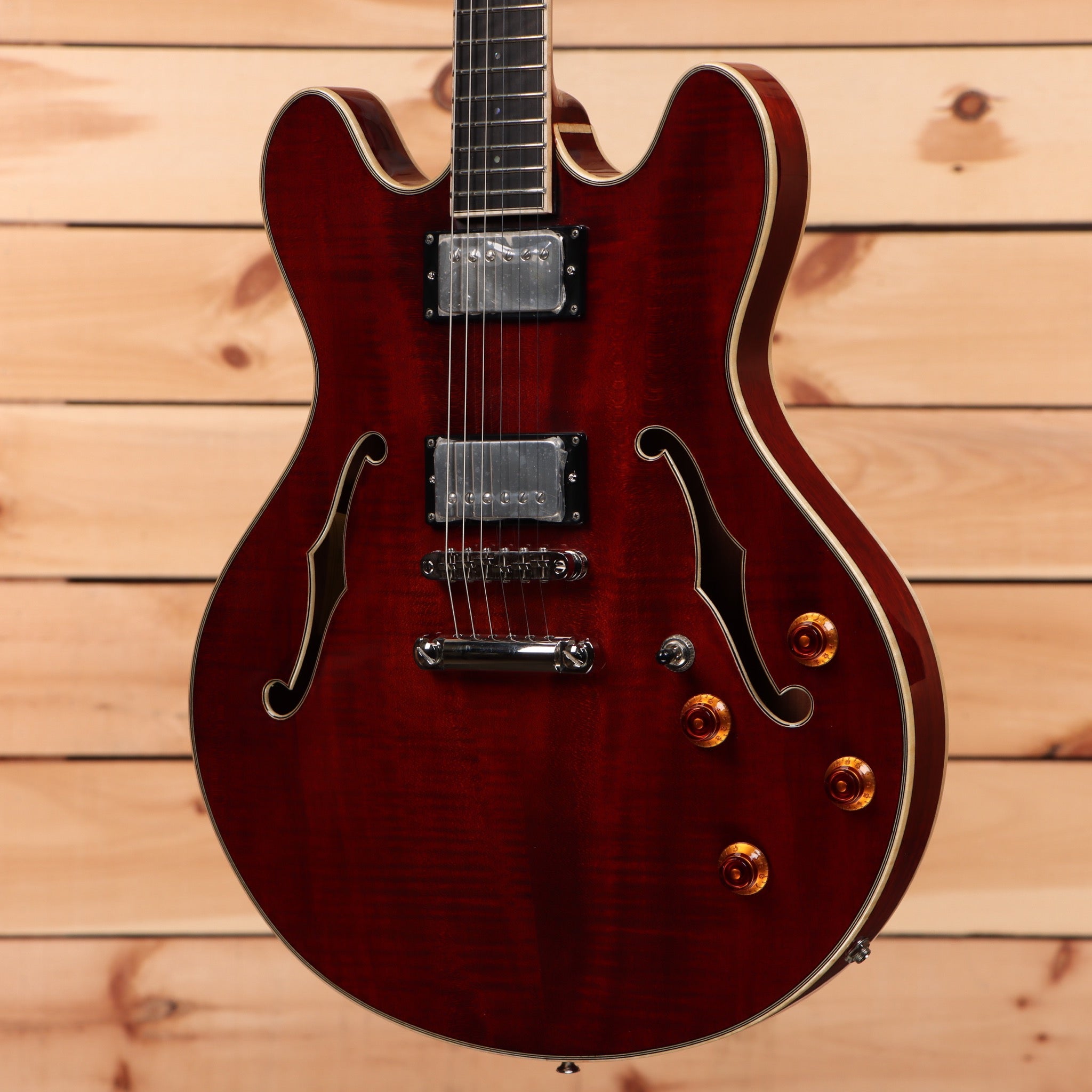 Eastman T186MX semi-hollow electric guitar Classic Red with dual humbuckers and f-holes